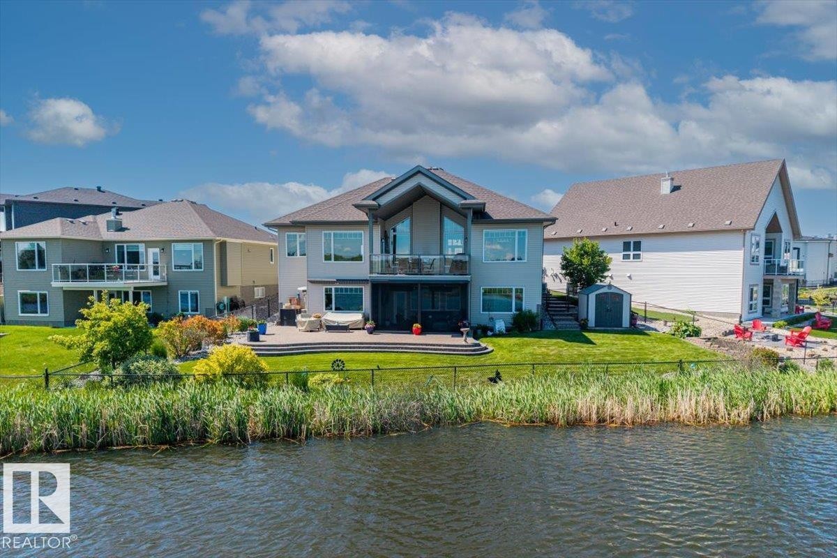 87 Lakeland Crescent, Beaumont, AB - Outdoor With Body Of Water With Deck Patio Veranda