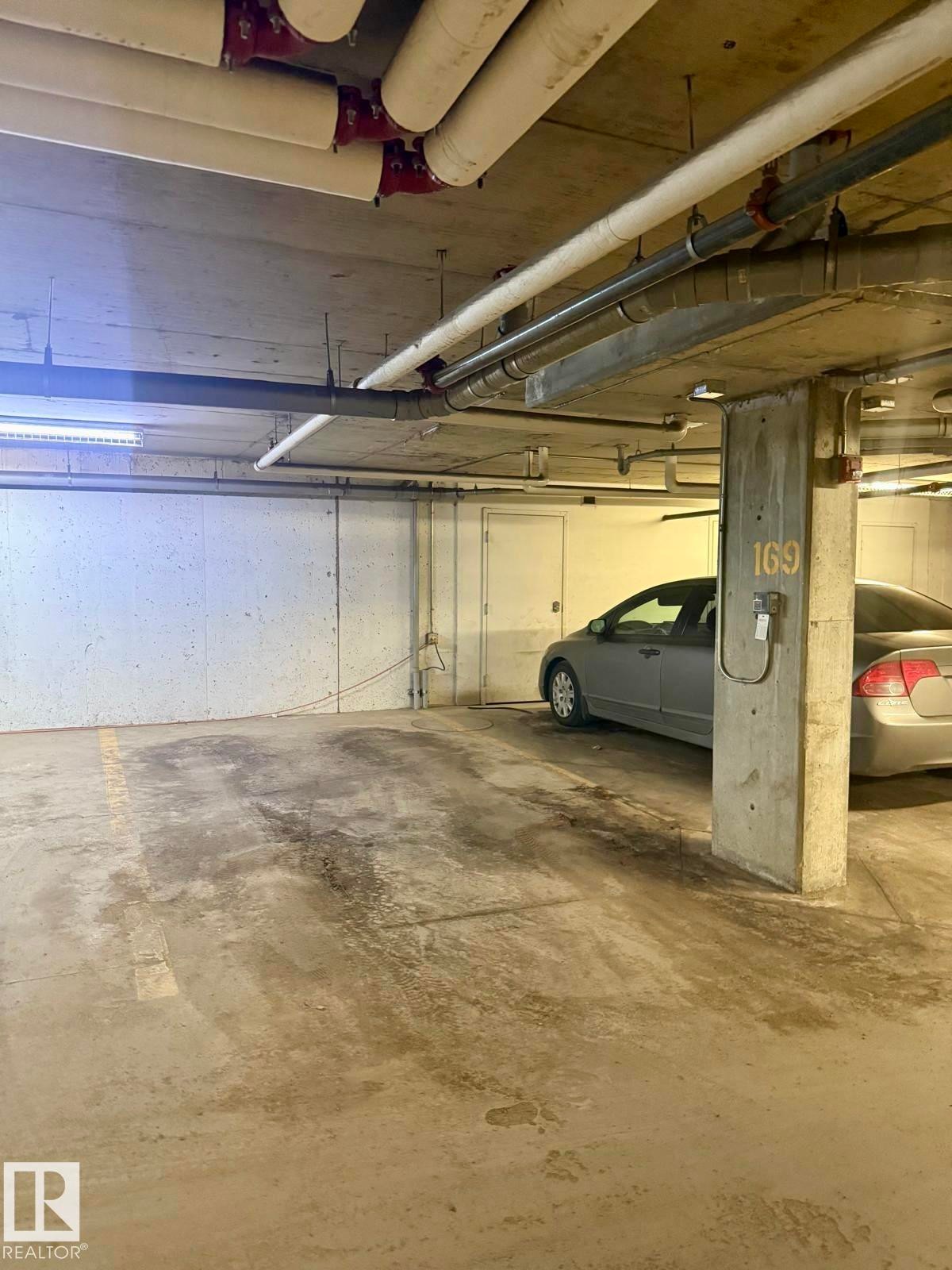 #303 1060 Mcconachie Bv Nw, Edmonton, AB - Indoor Photo Showing Garage