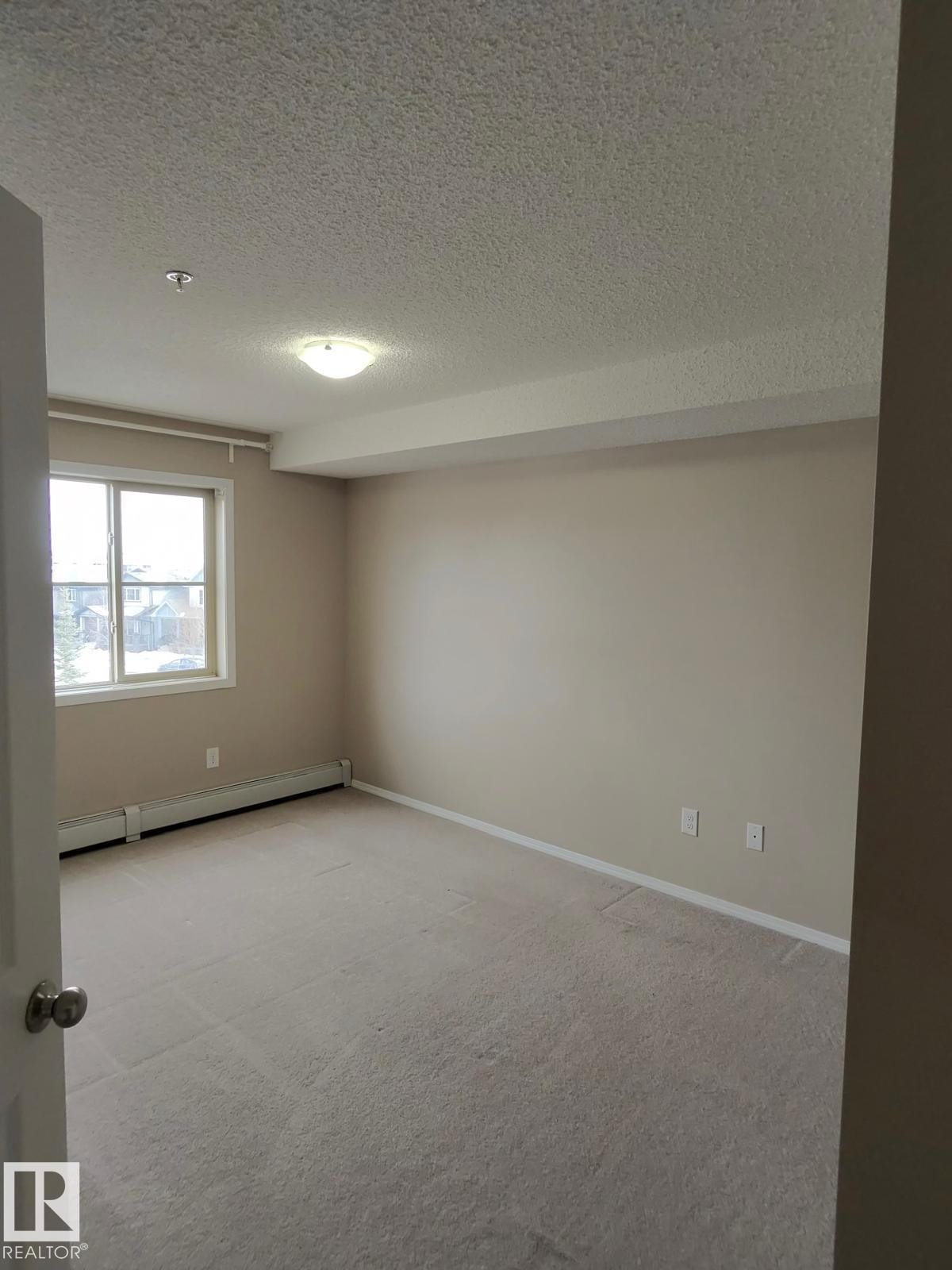 #303 1060 Mcconachie Bv Nw, Edmonton, AB - Indoor Photo Showing Other Room