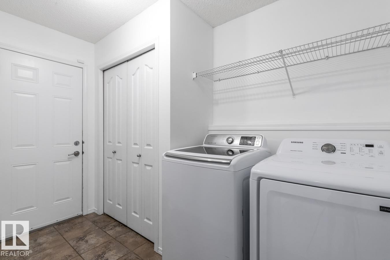 Laundry Area Just By The Door To The Garage On The Main Floor. - 4717 60 Street, Beaumont, AB