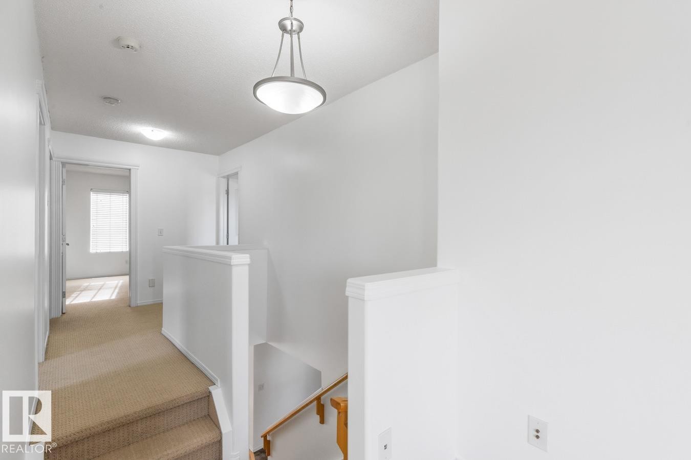 Stairs Leading To The Upper Floor. - 4717 60 Street, Beaumont, AB