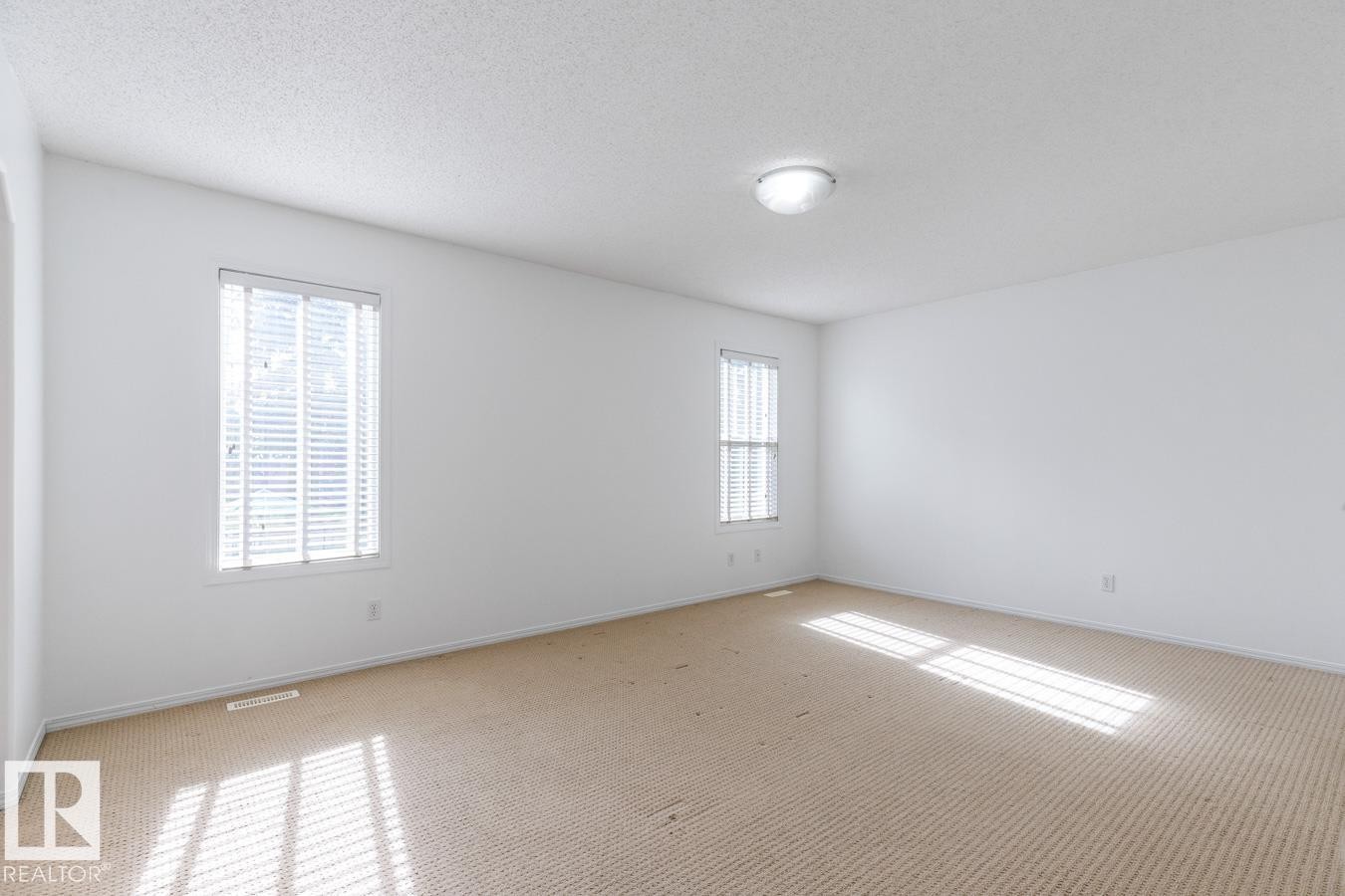 Spacious Primary Bedroom. - 4717 60 Street, Beaumont, AB