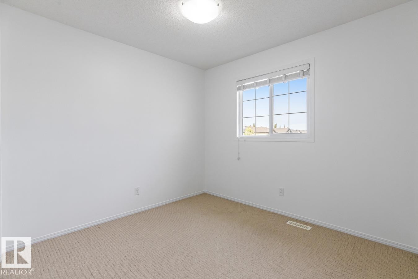 Second Bedroom Upstairs. - 4717 60 Street, Beaumont, AB