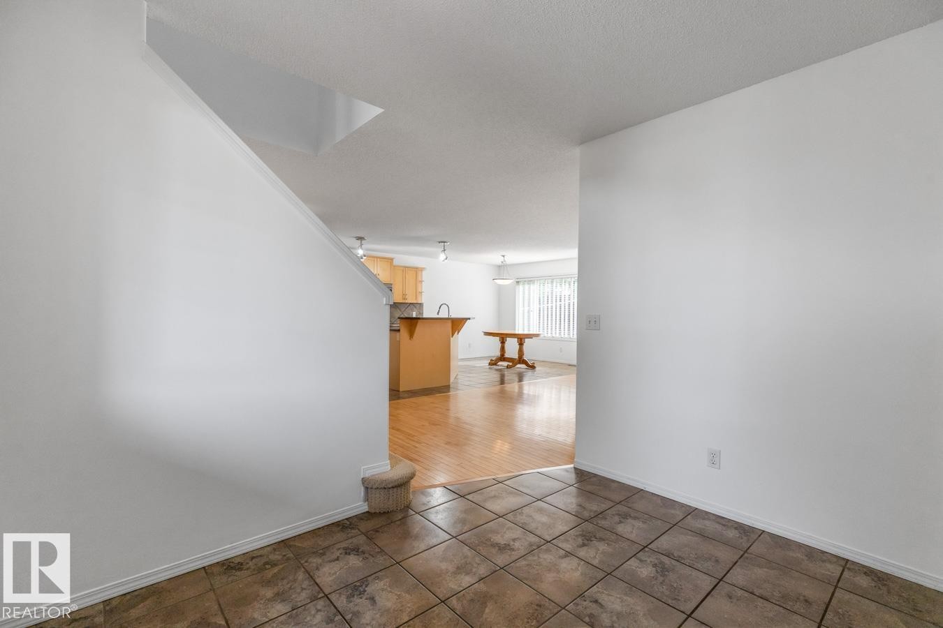 View From The Front Entrance Looking Into The Kitchen. - 4717 60 Street, Beaumont, AB