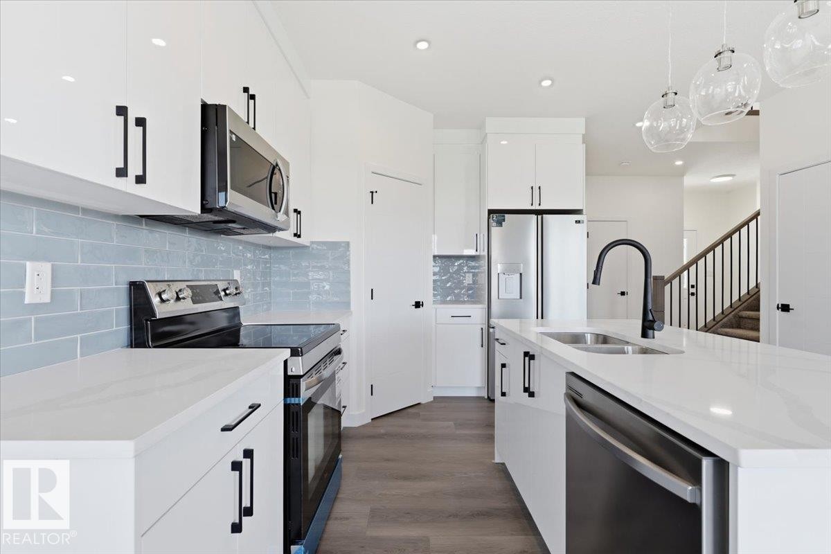 5221 47 Ave, Calmar, AB - Indoor Photo Showing Kitchen With Double Sink With Upgraded Kitchen