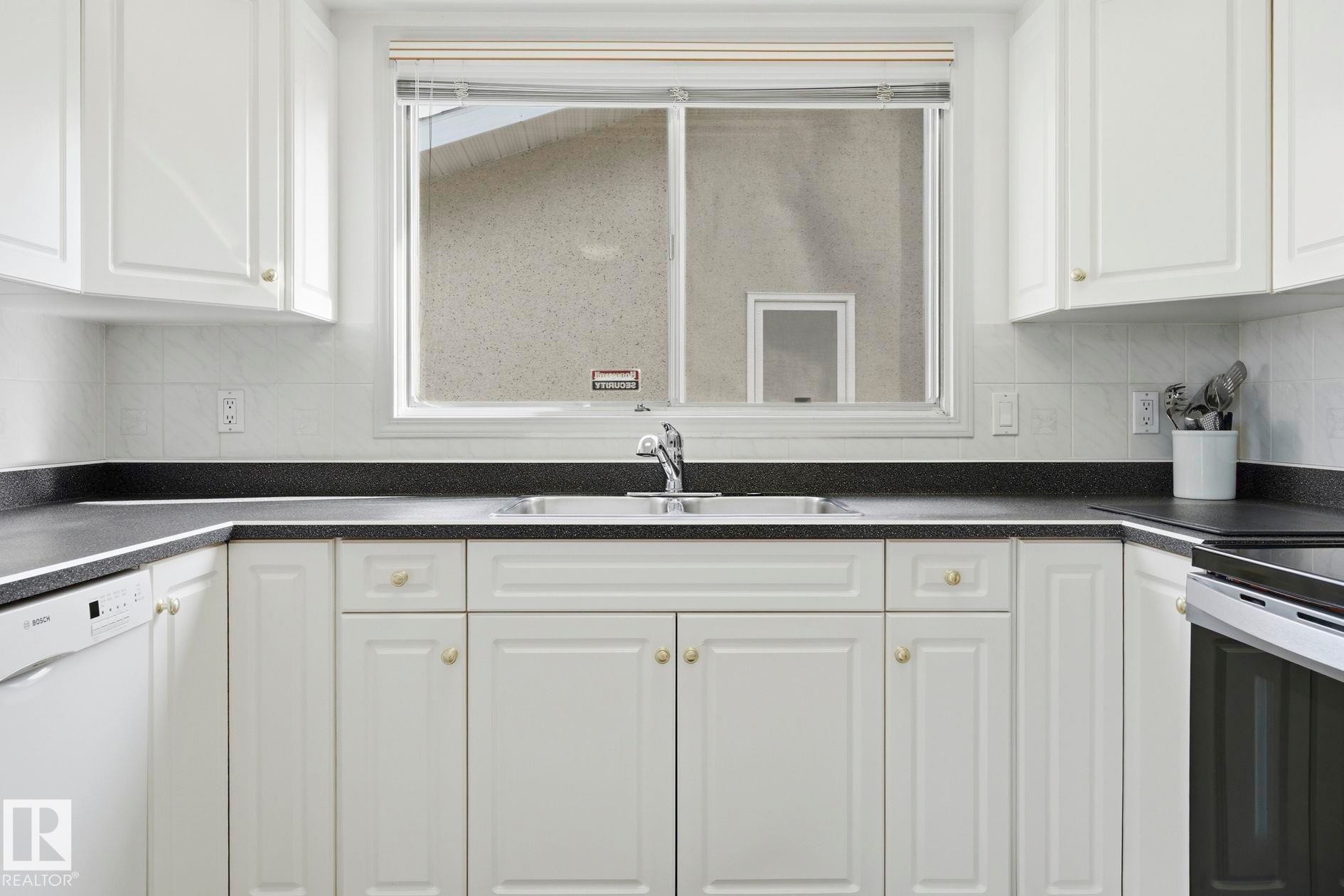 14511 83 Street Nw, Edmonton, AB - Indoor Photo Showing Kitchen With Double Sink