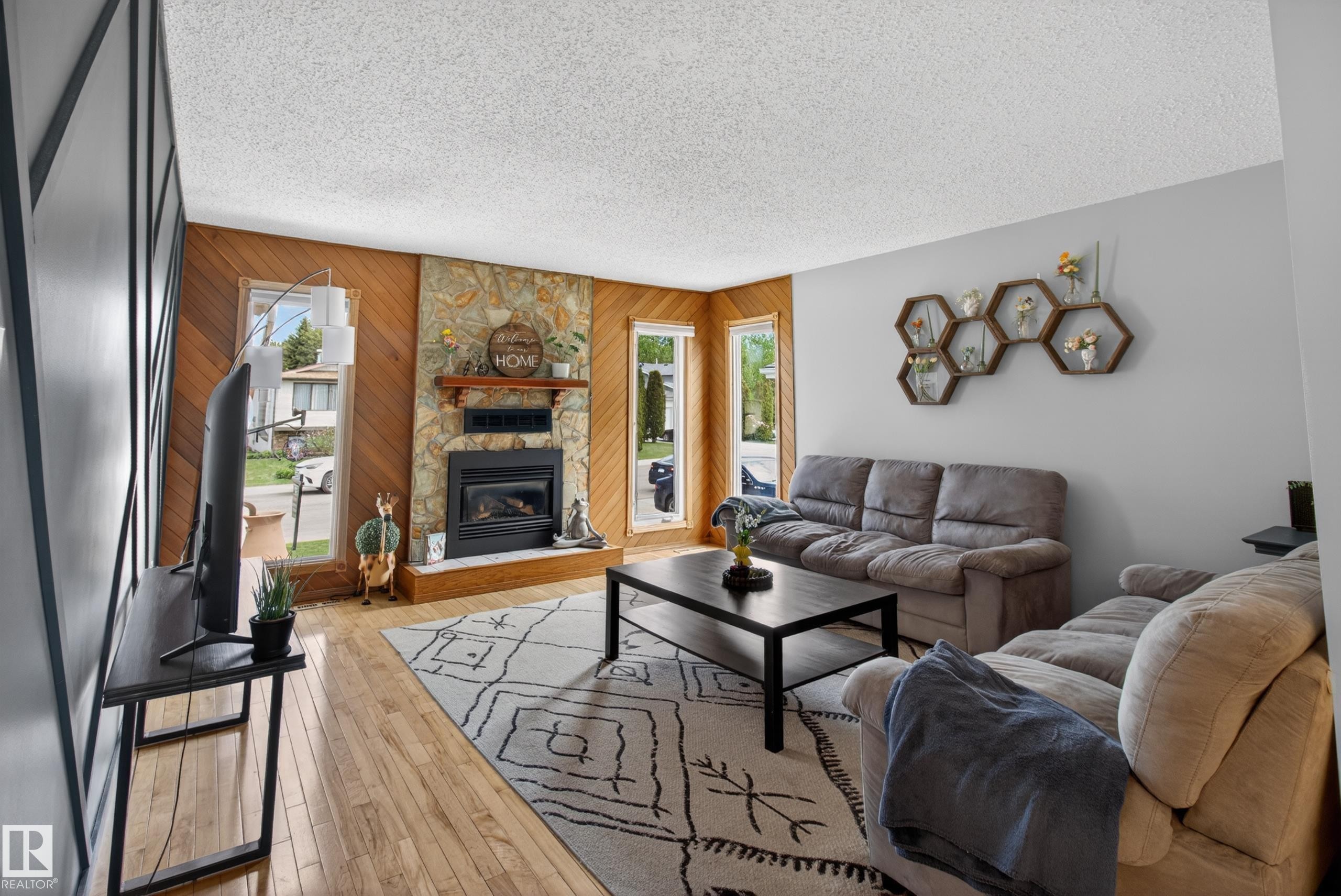 5329 65 St, Redwater, AB - Indoor Photo Showing Living Room With Fireplace