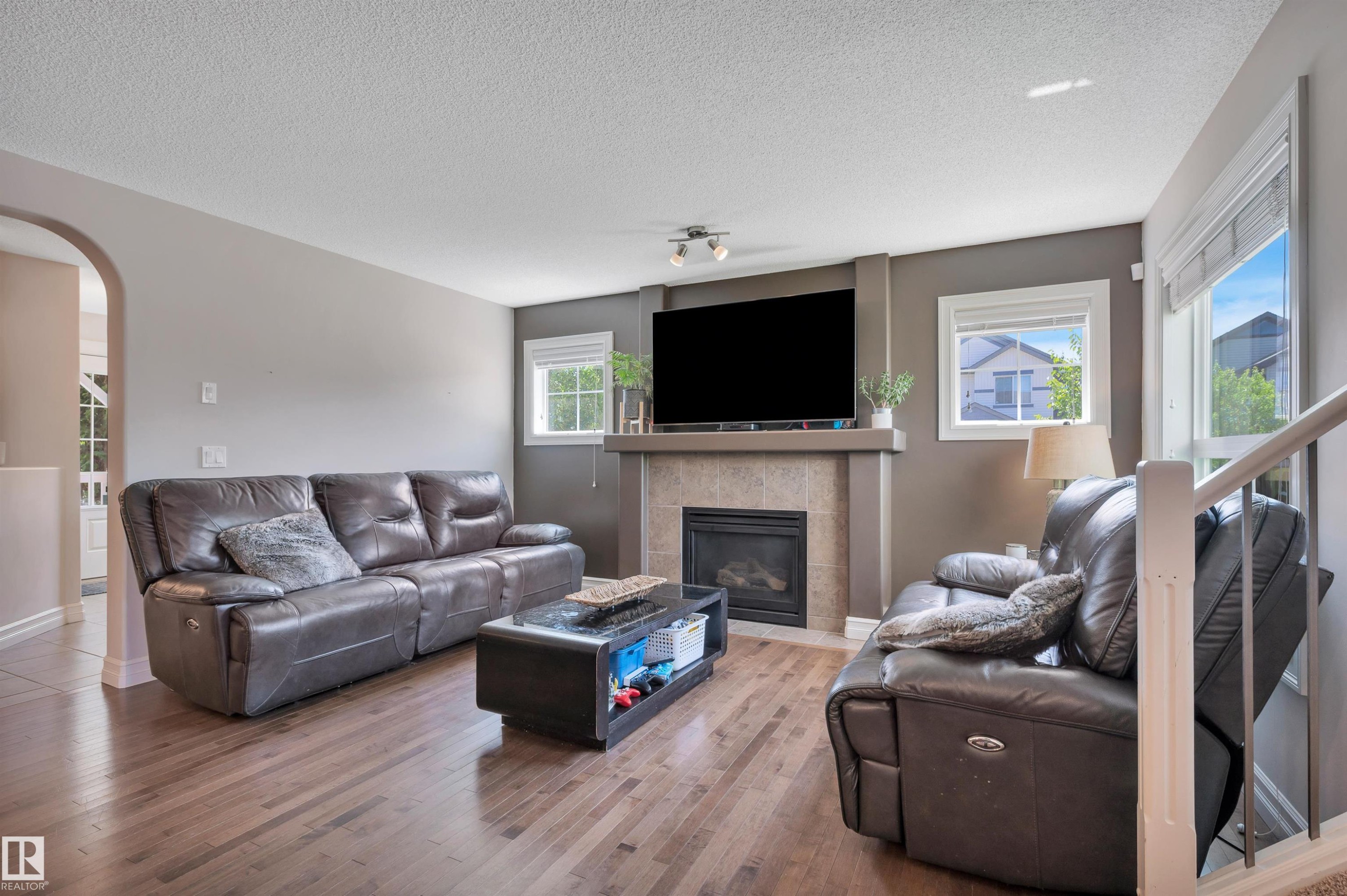 1740 59 Street Sw, Edmonton, AB - Indoor Photo Showing Living Room With Fireplace