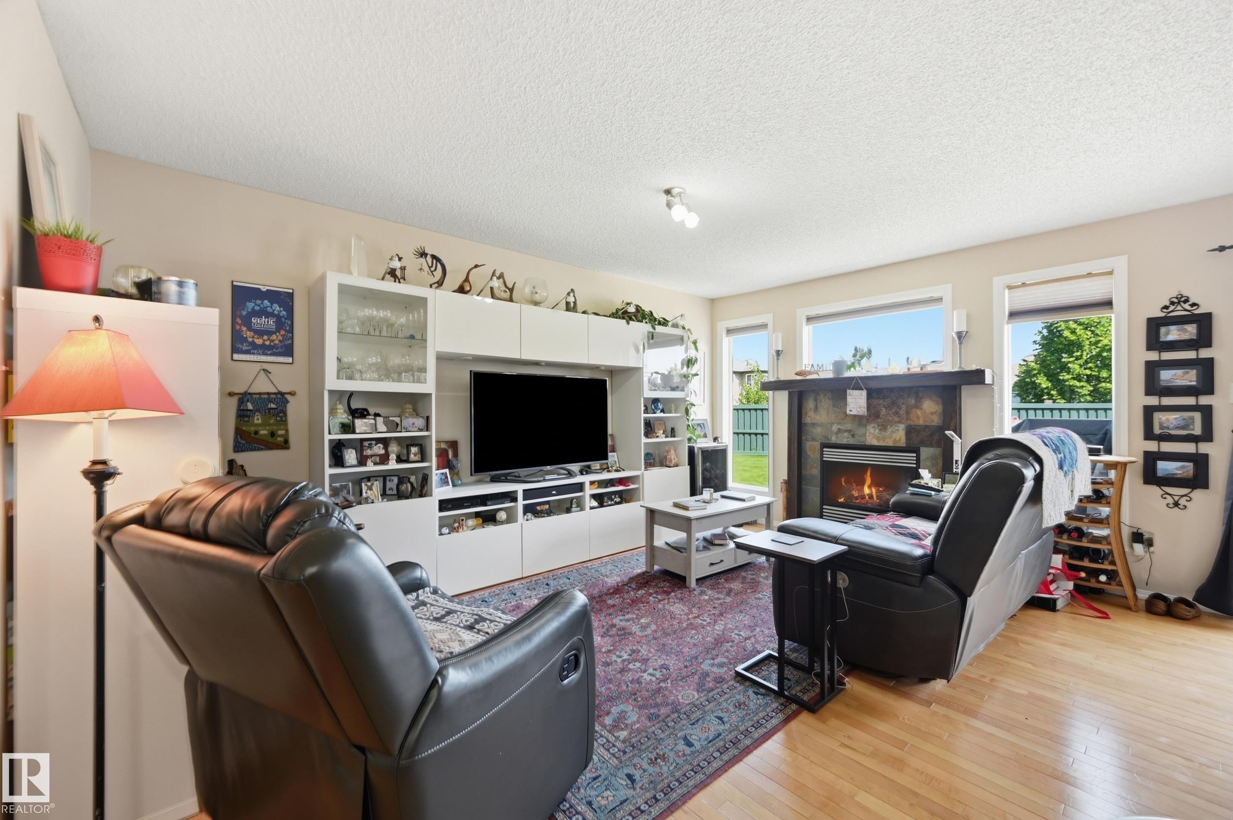 1867 119 Street Sw, Edmonton, AB - Indoor Photo Showing Living Room With Fireplace