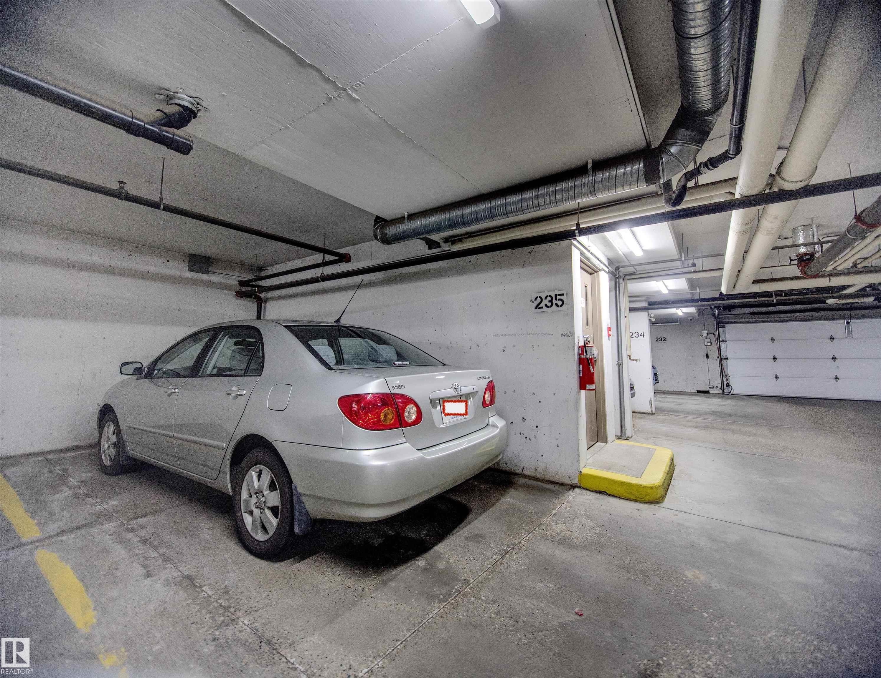#409 4403 23 St Nw, Edmonton, AB - Indoor Photo Showing Garage