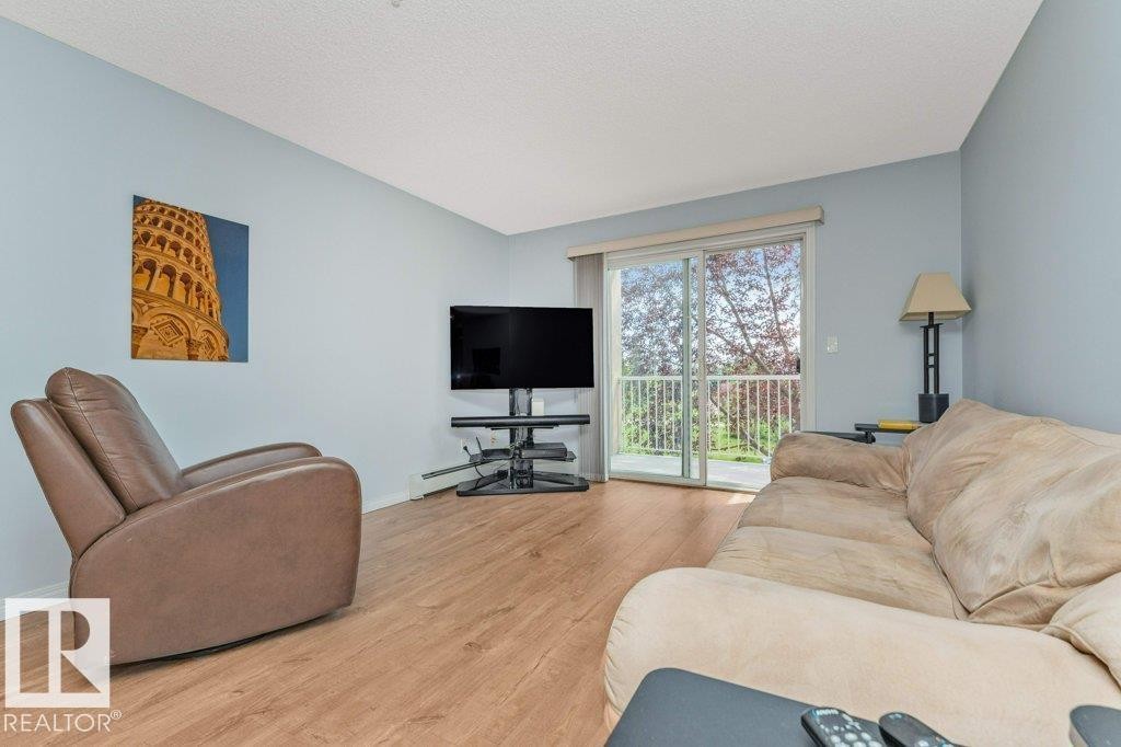 #217 245 Edwards Dr Sw, Edmonton, AB - Indoor Photo Showing Living Room
