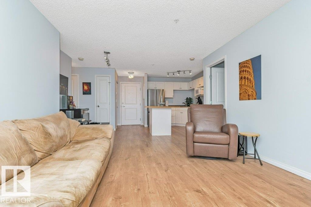 #217 245 Edwards Dr Sw, Edmonton, AB - Indoor Photo Showing Living Room