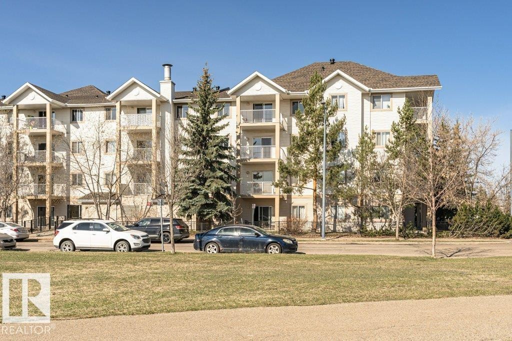 #217 245 Edwards Dr Sw, Edmonton, AB - Outdoor With Balcony With Facade