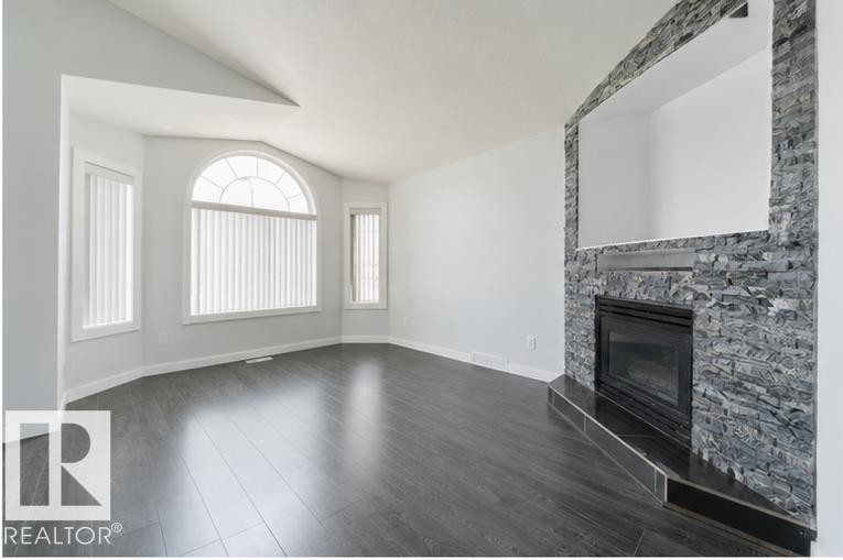 417 Hollick-Kenyon Road Nw, Edmonton, AB - Indoor With Fireplace