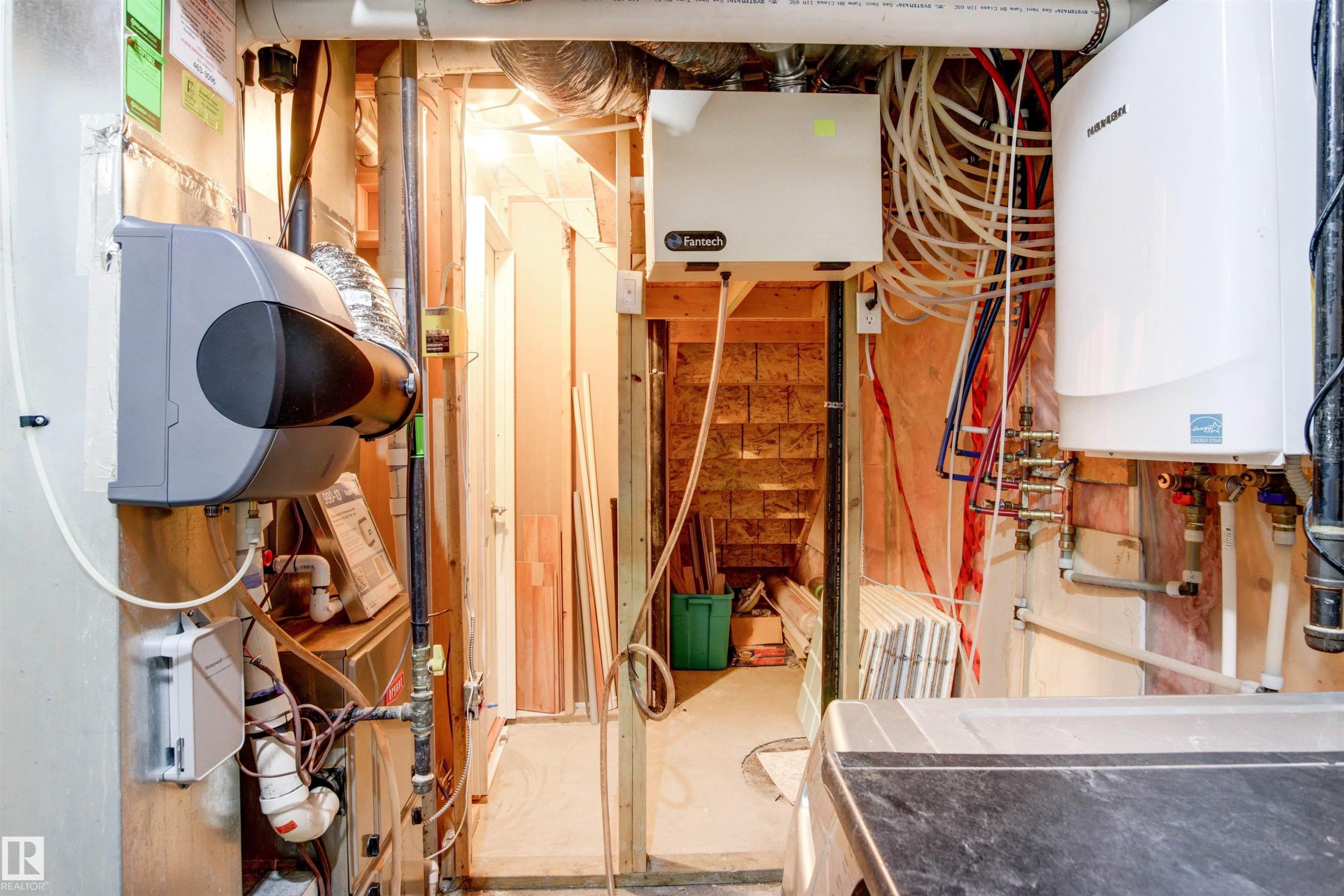 Utility area featuring exposed plumbing and HVAC systems - 1154 35A Avenue Nw, Edmonton, AB - Indoor Photo Showing Basement