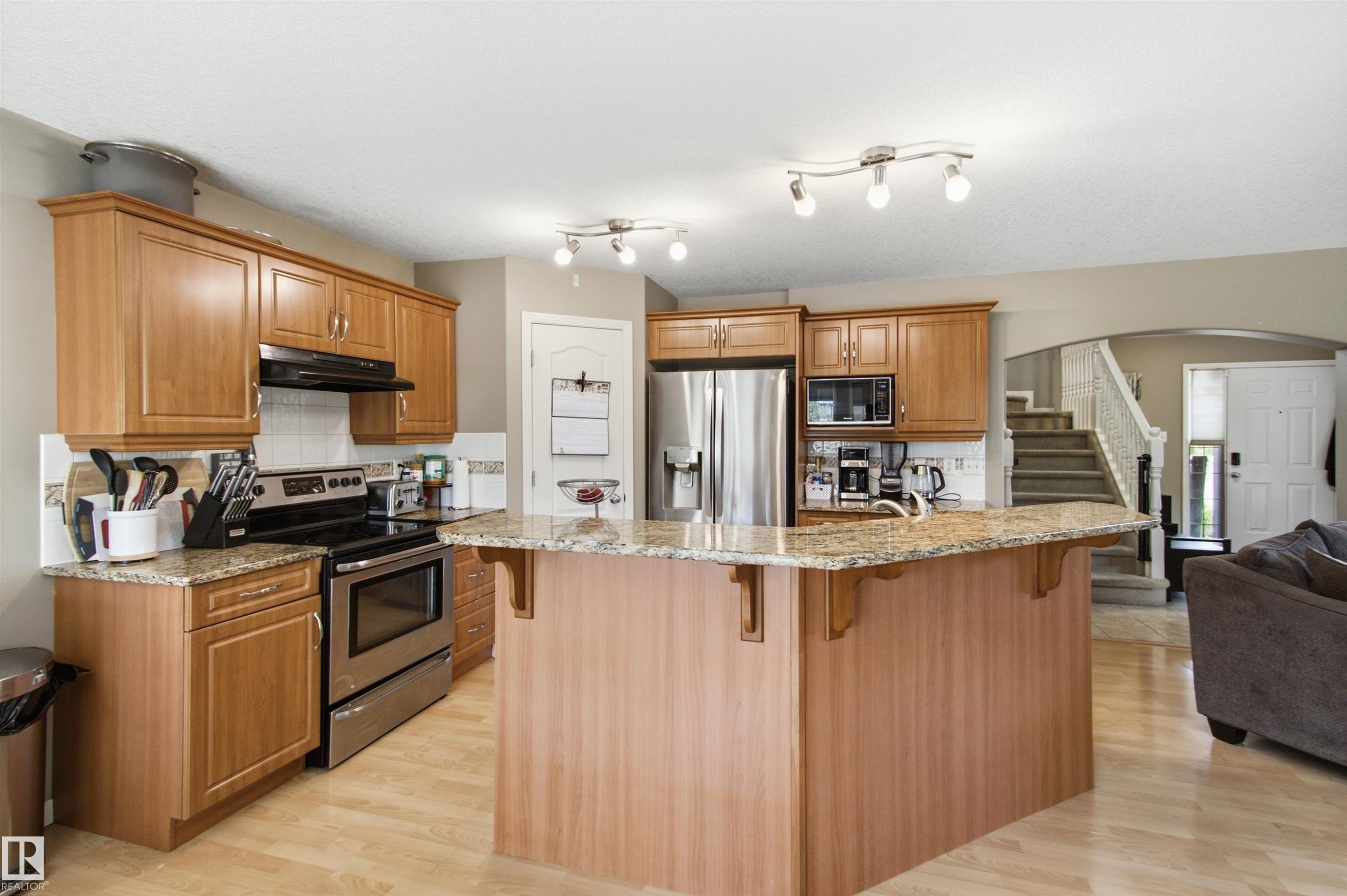 8203 5 Avenue Sw, Edmonton, AB - Indoor Photo Showing Kitchen With Stainless Steel Kitchen