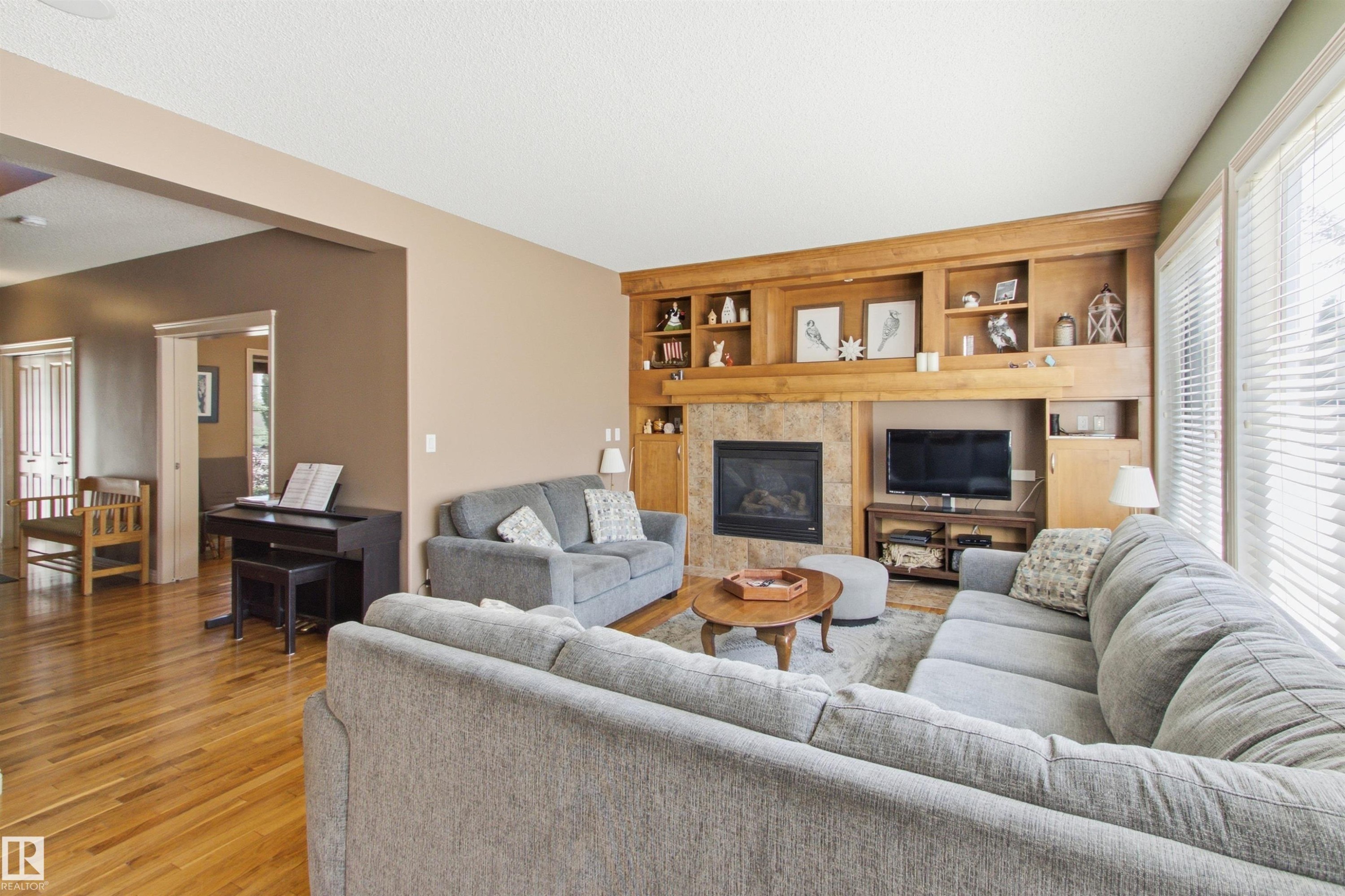 12429 17A Avenue Sw, Edmonton, AB - Indoor Photo Showing Living Room With Fireplace