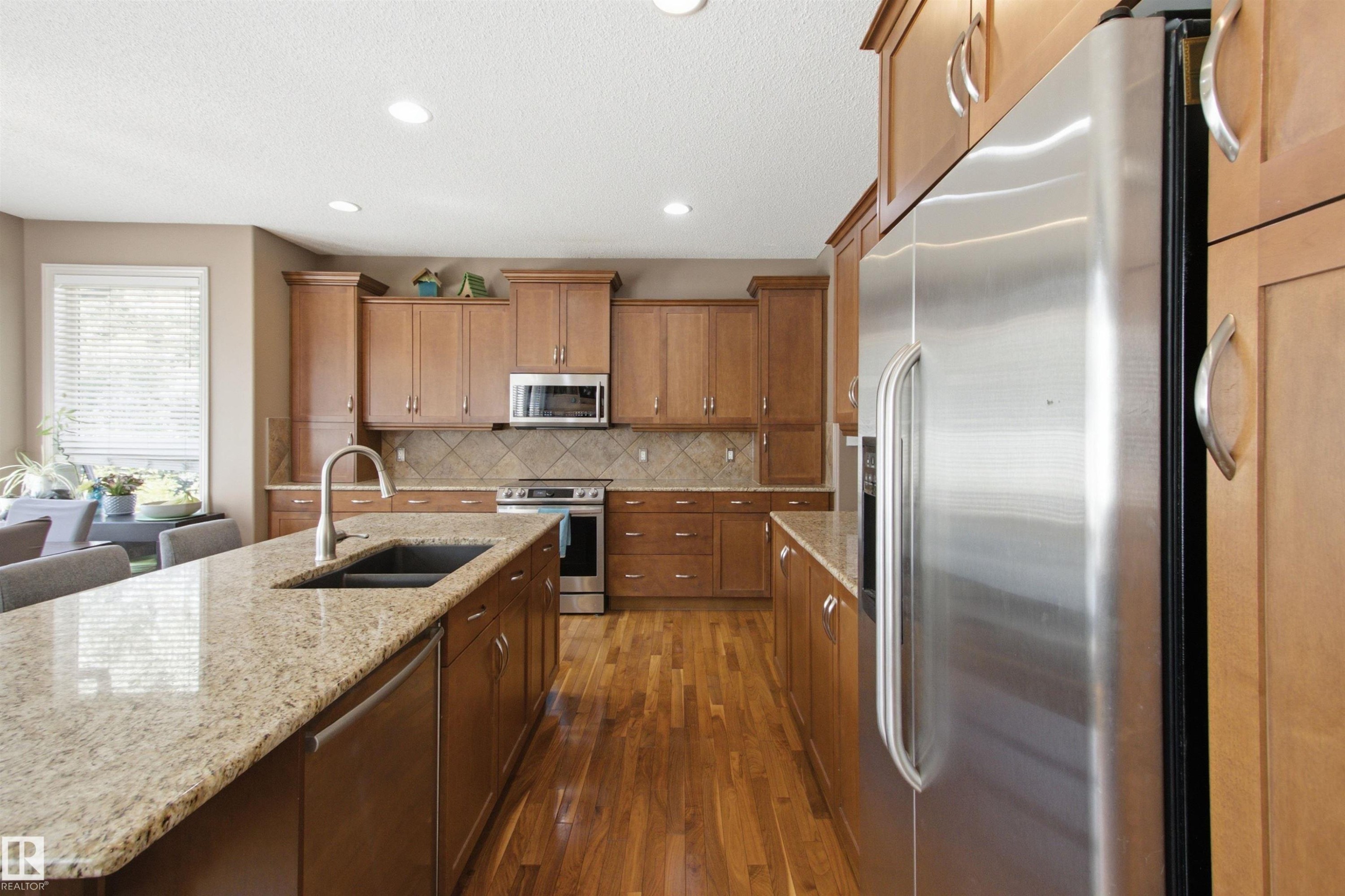 12429 17A Avenue Sw, Edmonton, AB - Indoor Photo Showing Kitchen With Double Sink With Upgraded Kitchen