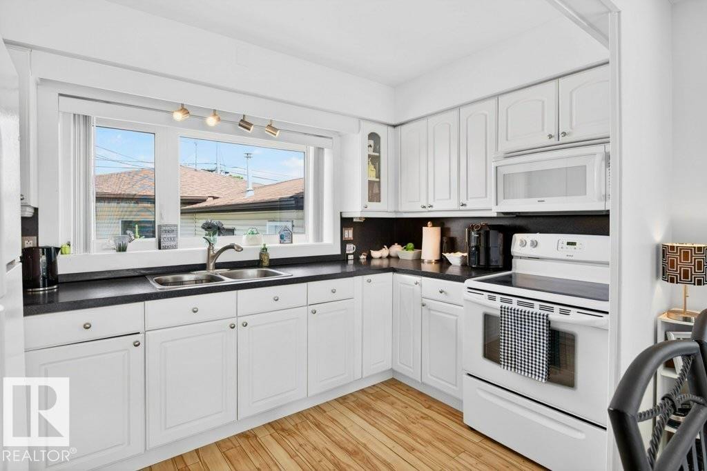 13523 65 Street, Edmonton, AB - Indoor Photo Showing Kitchen With Double Sink