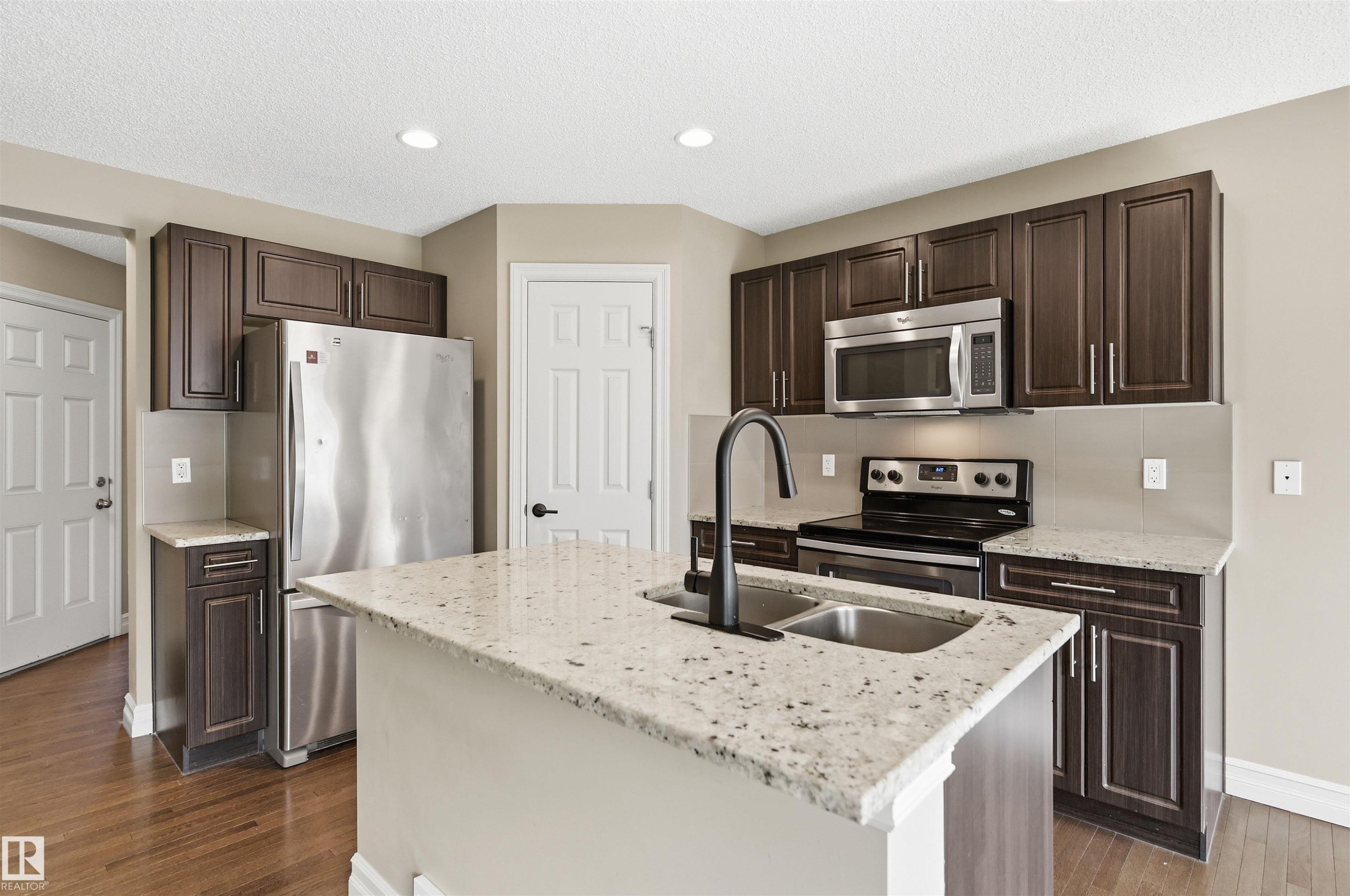 #11 5317 3 Av Sw, Edmonton, AB - Indoor Photo Showing Kitchen With Stainless Steel Kitchen With Double Sink With Upgraded Kitchen