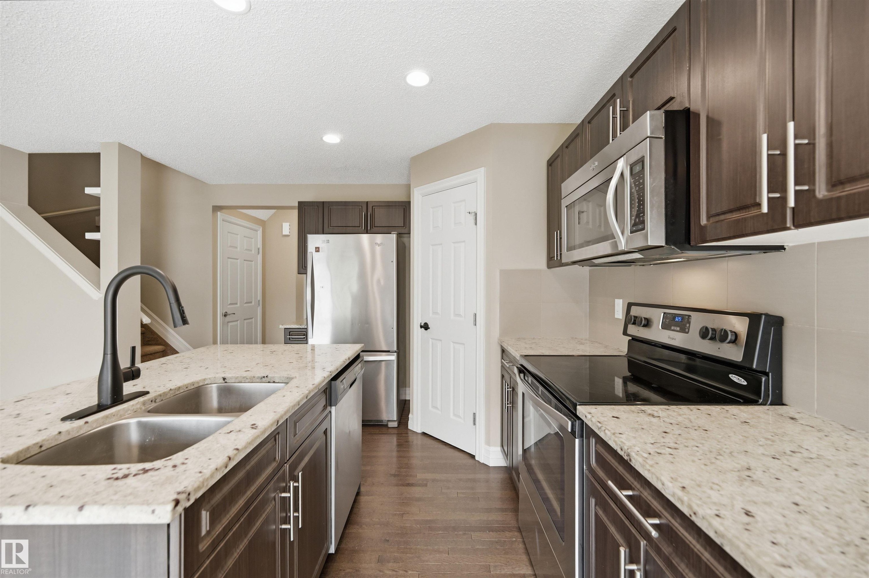 #11 5317 3 Av Sw, Edmonton, AB - Indoor Photo Showing Kitchen With Stainless Steel Kitchen With Double Sink With Upgraded Kitchen
