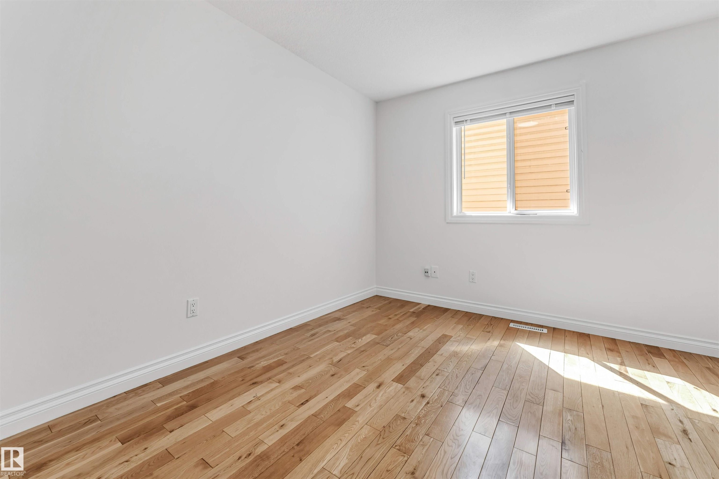 Empty room - 16205 55 Street Nw, Edmonton, AB - Indoor Photo Showing Other Room