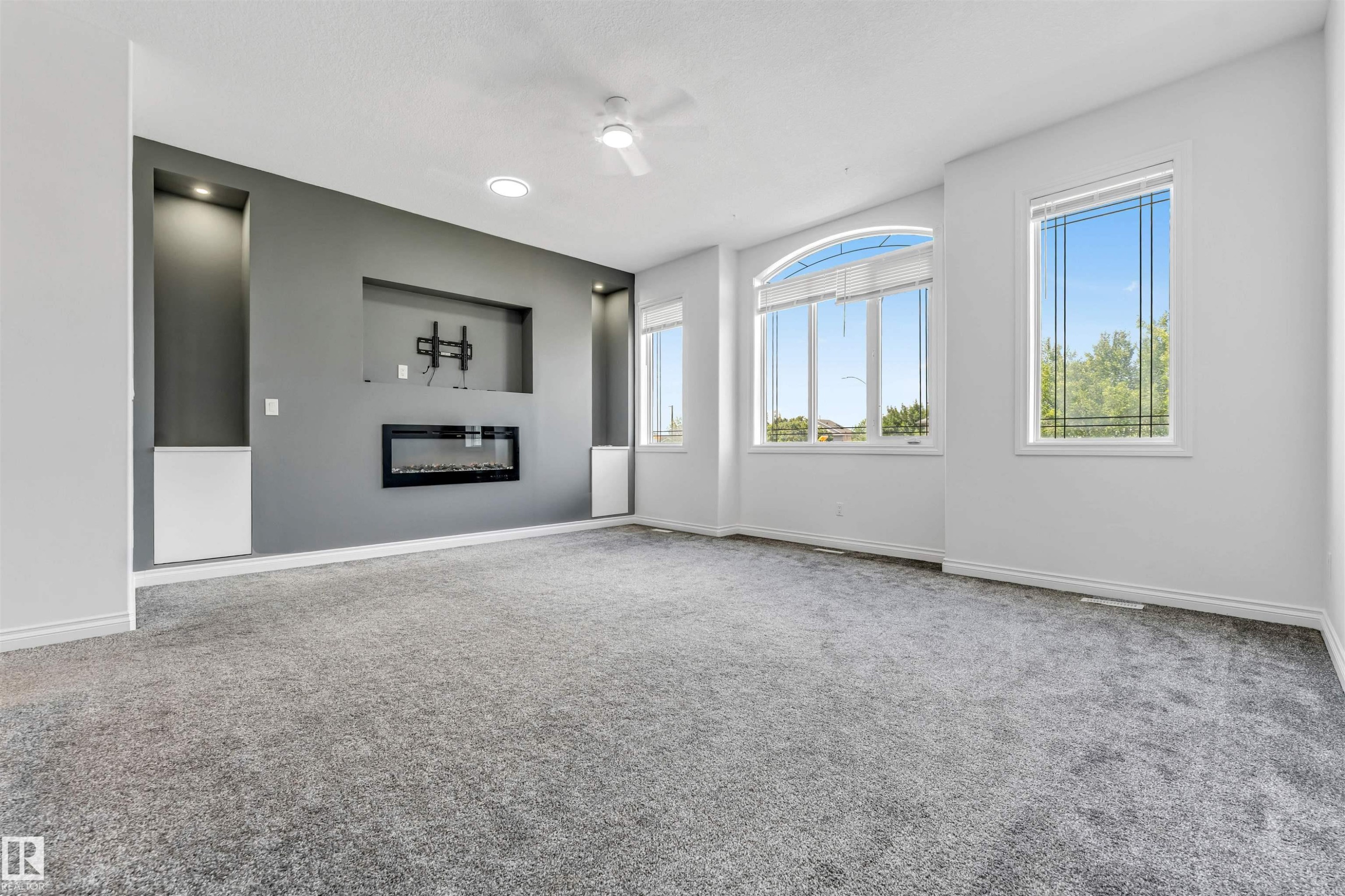 Living room - 16205 55 Street Nw, Edmonton, AB - Indoor With Fireplace