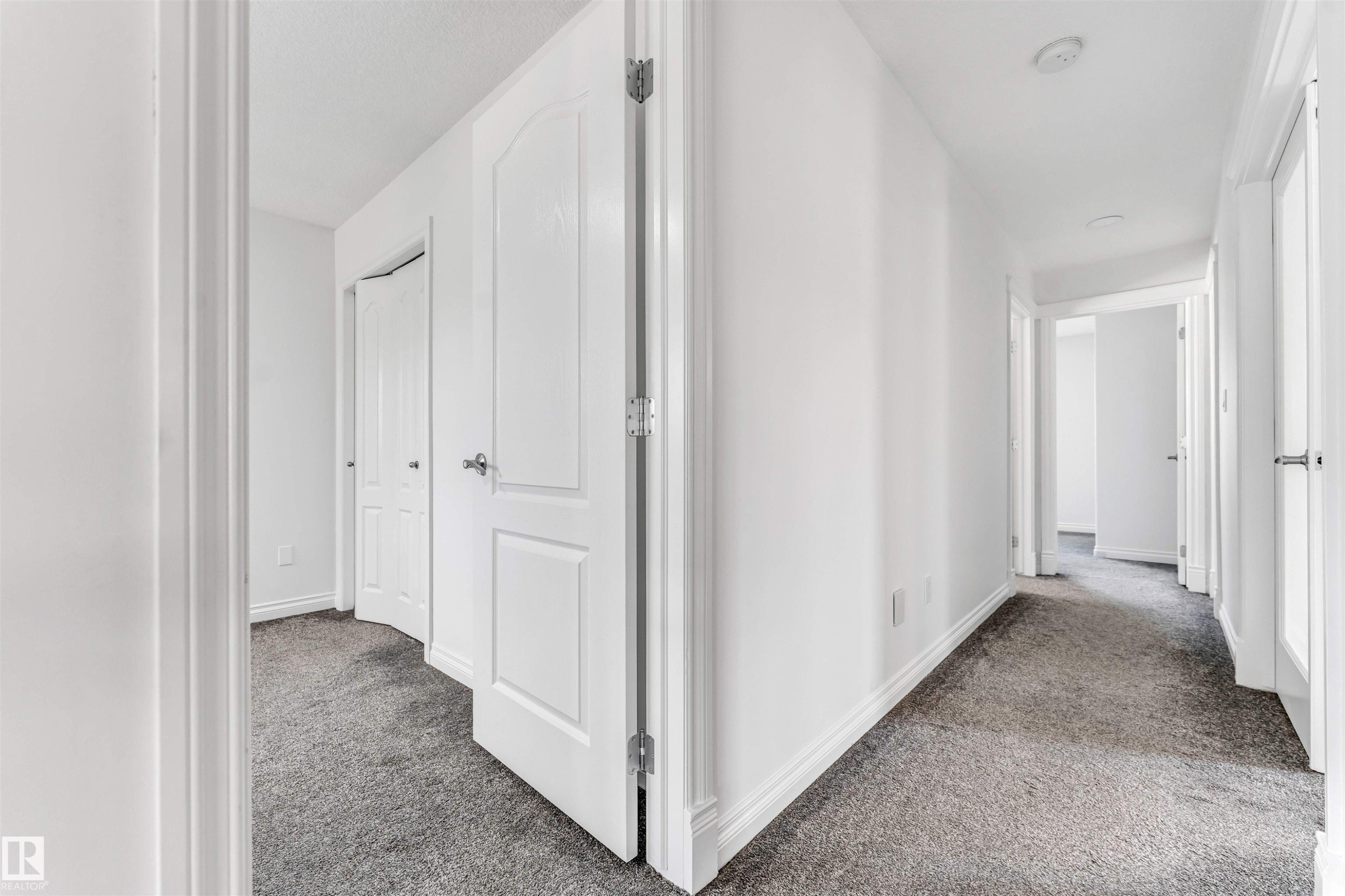 Corridor - 16205 55 Street Nw, Edmonton, AB - Indoor Photo Showing Other Room