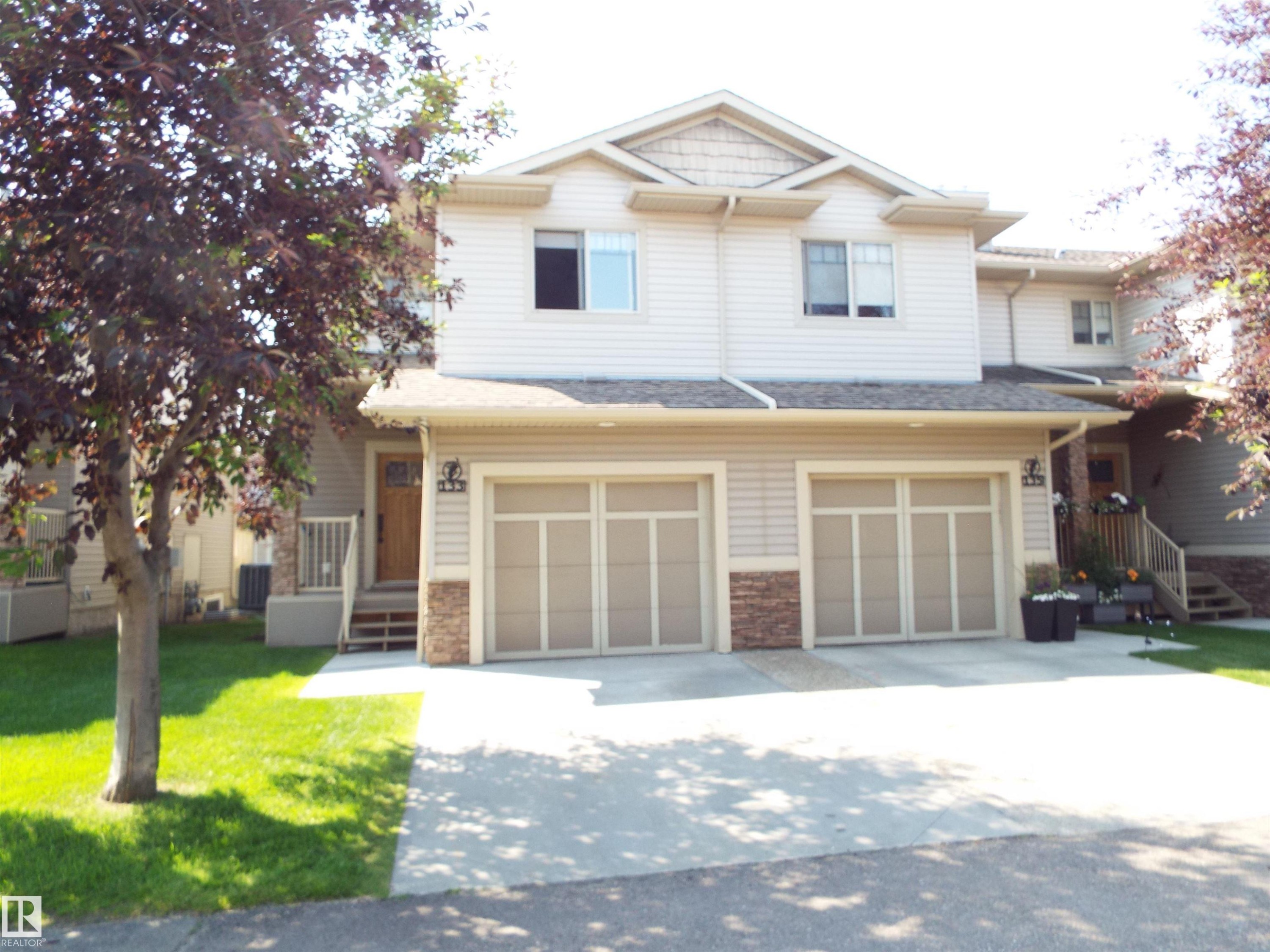#133 5420 Grant Macewan Bv, Leduc, AB - Outdoor With Facade