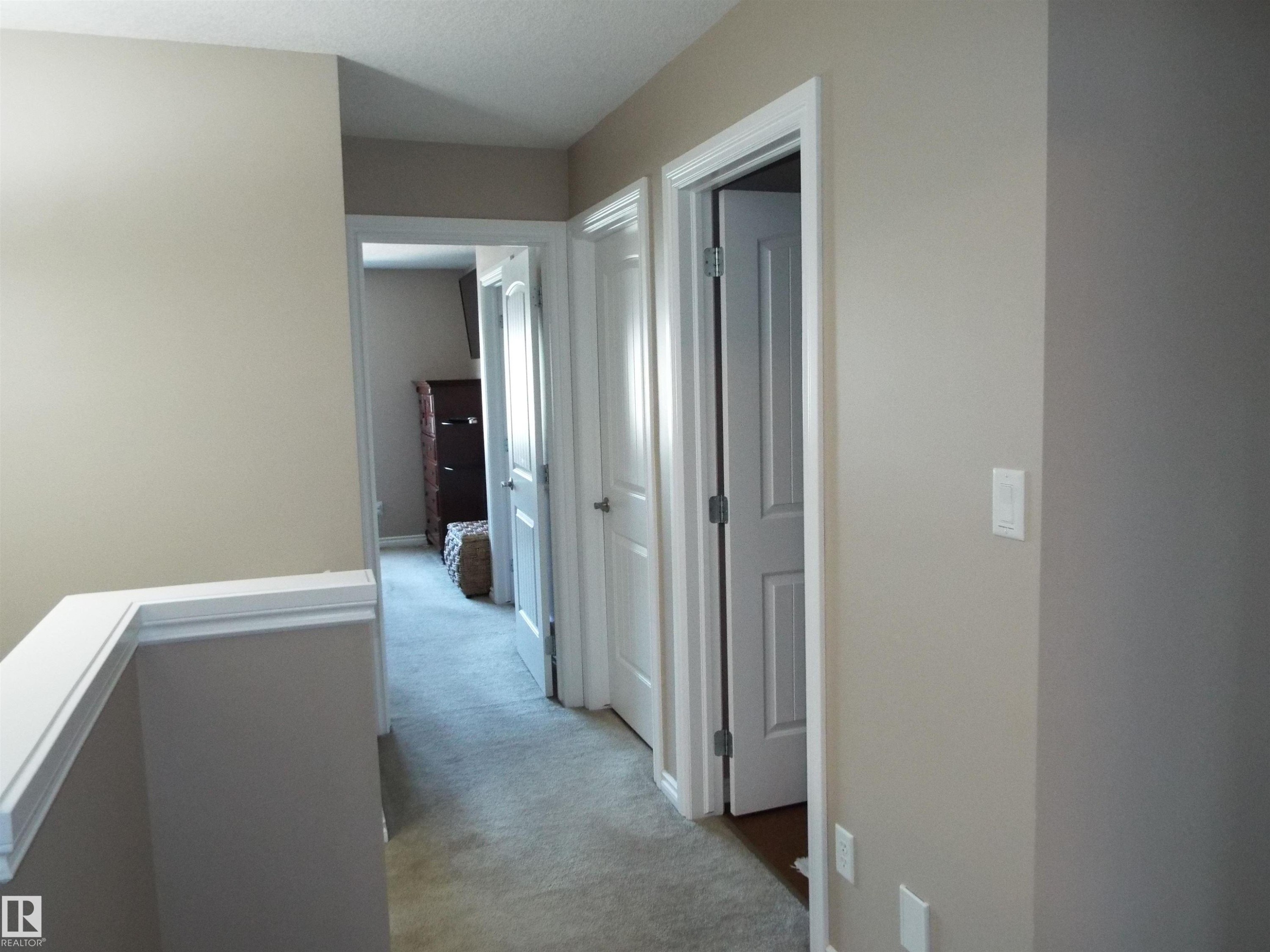 #133 5420 Grant Macewan Bv, Leduc, AB - Indoor Photo Showing Other Room