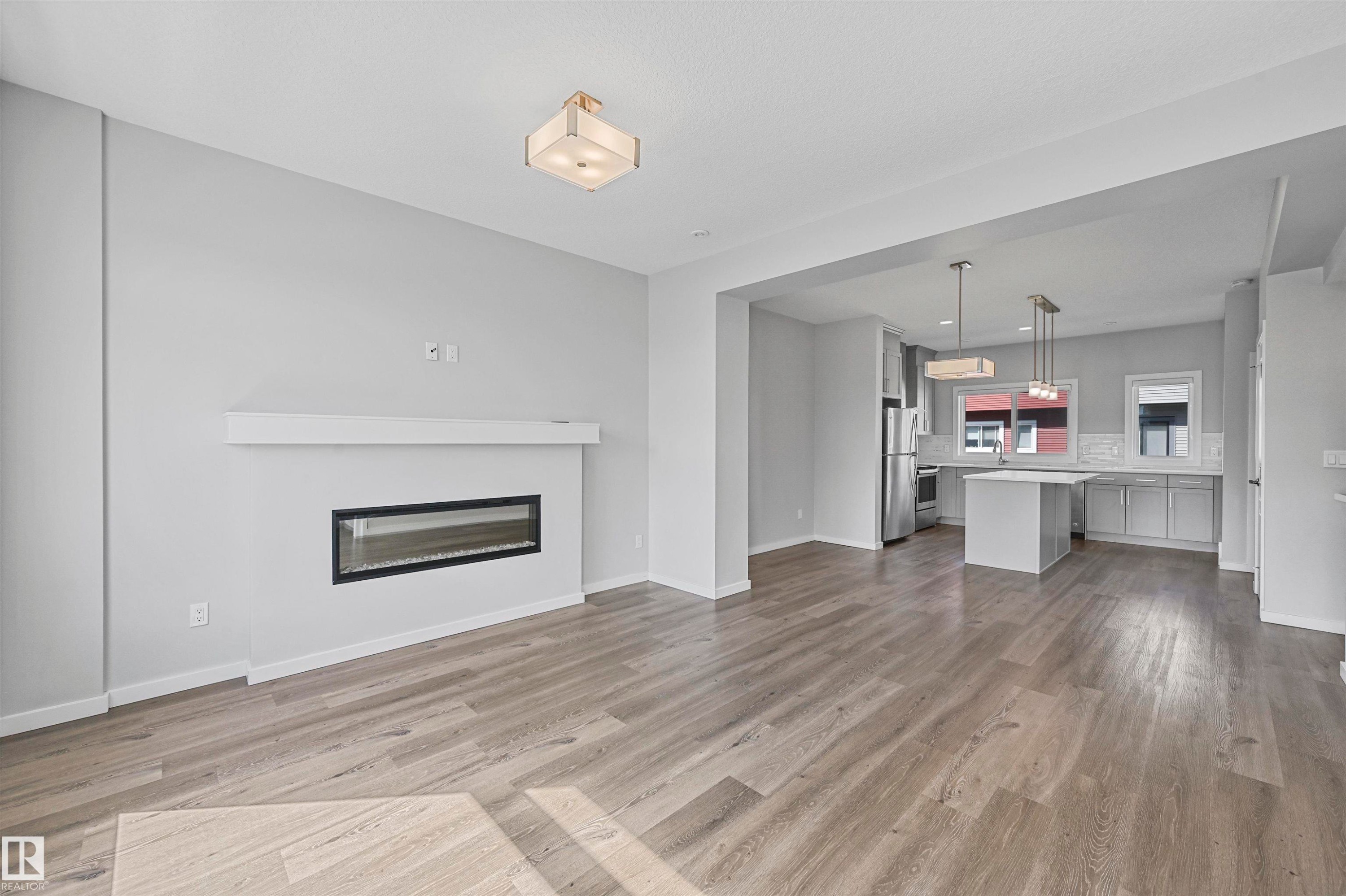 #72 1010 Rabbit Hill Rd Sw, Edmonton, AB - Indoor With Fireplace