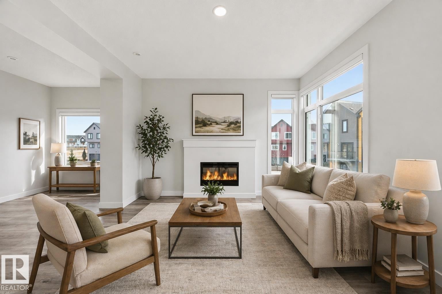 virtually staged - #77 1010 Rabbit Hill Rd Sw, Edmonton, AB - Indoor Photo Showing Living Room With Fireplace