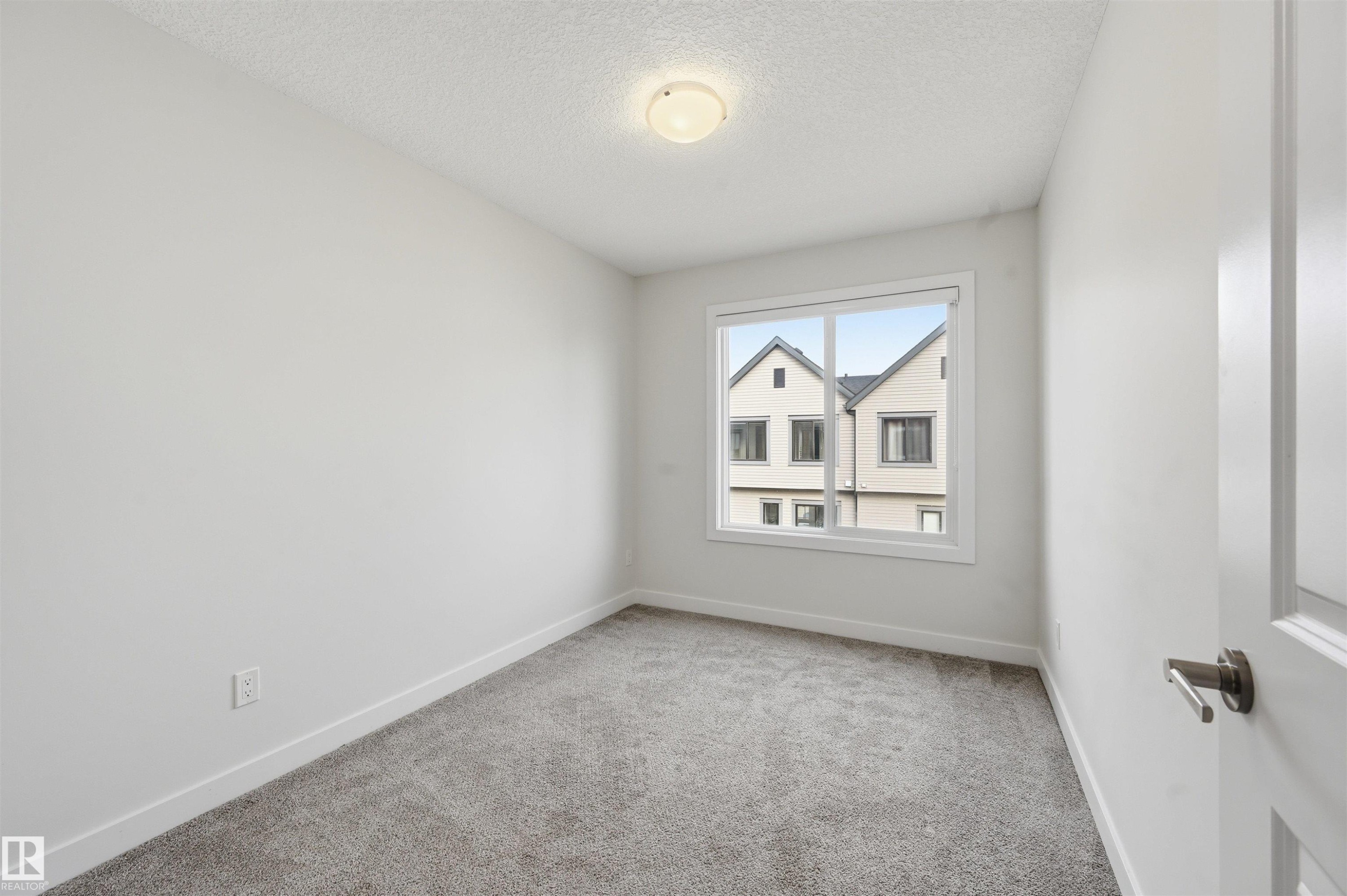 #77 1010 Rabbit Hill Rd Sw, Edmonton, AB - Indoor Photo Showing Other Room