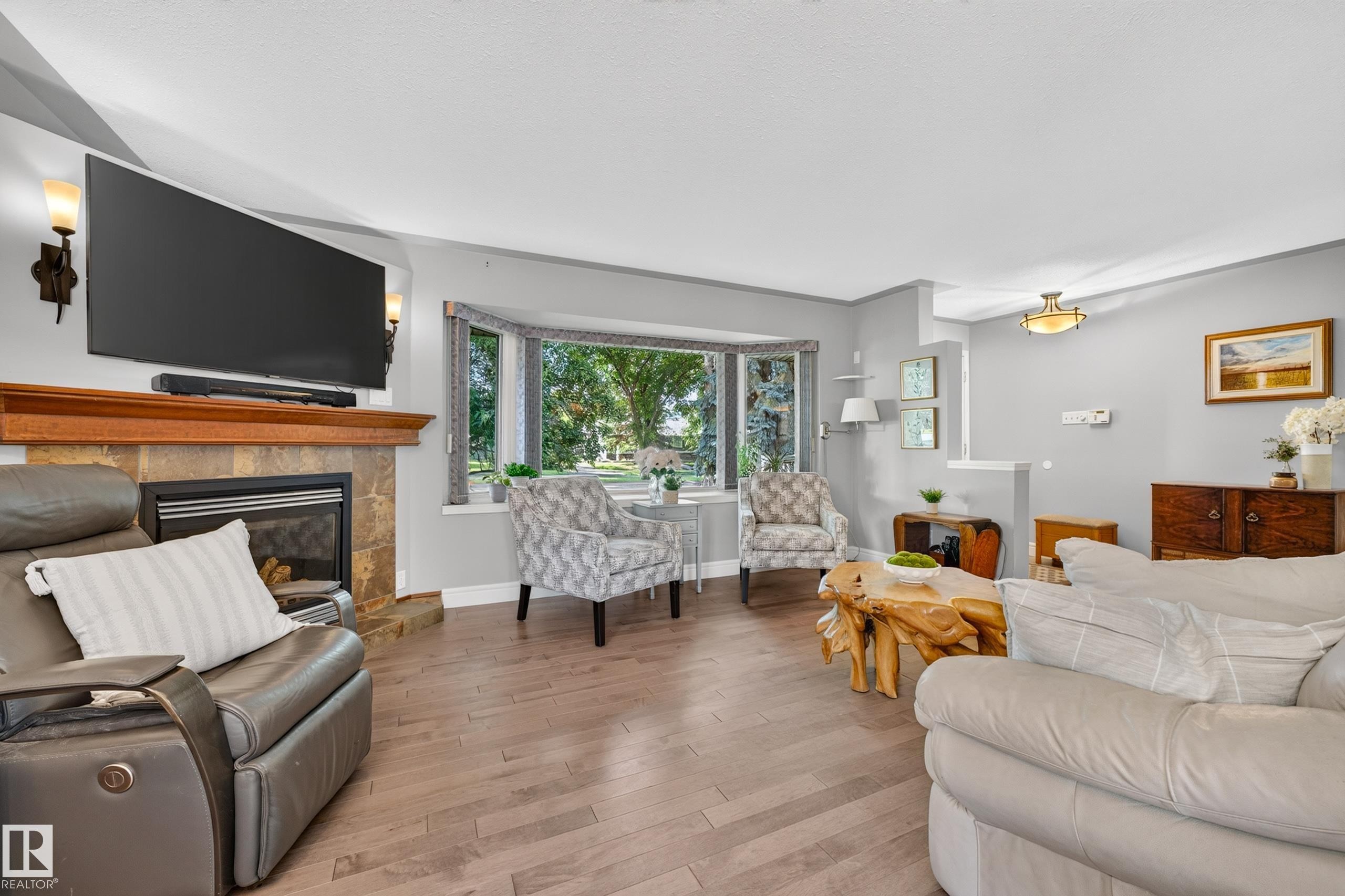 6716 101A Avenue Nw, Edmonton, AB - Indoor Photo Showing Living Room With Fireplace