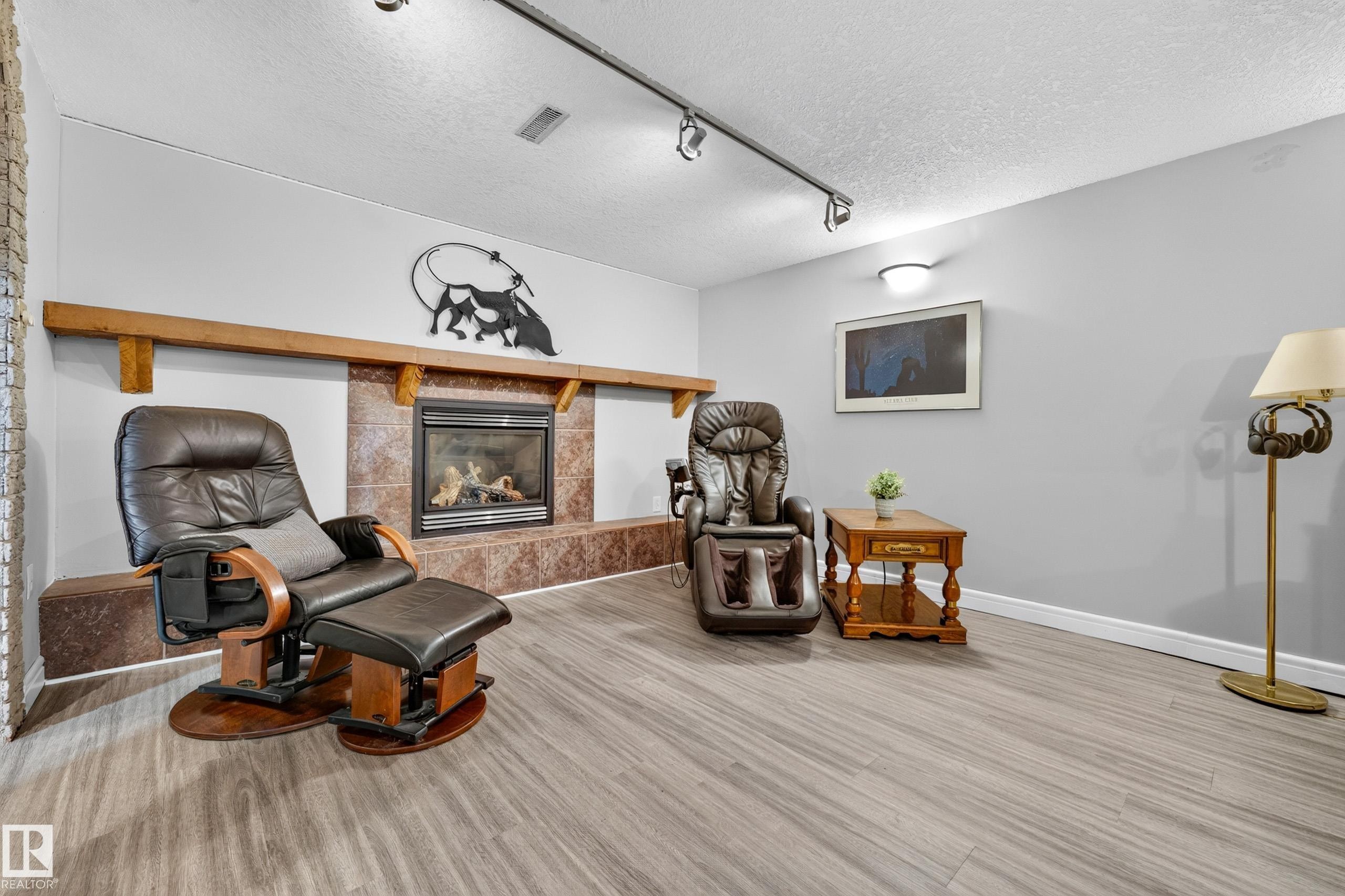 6716 101A Avenue Nw, Edmonton, AB - Indoor With Fireplace