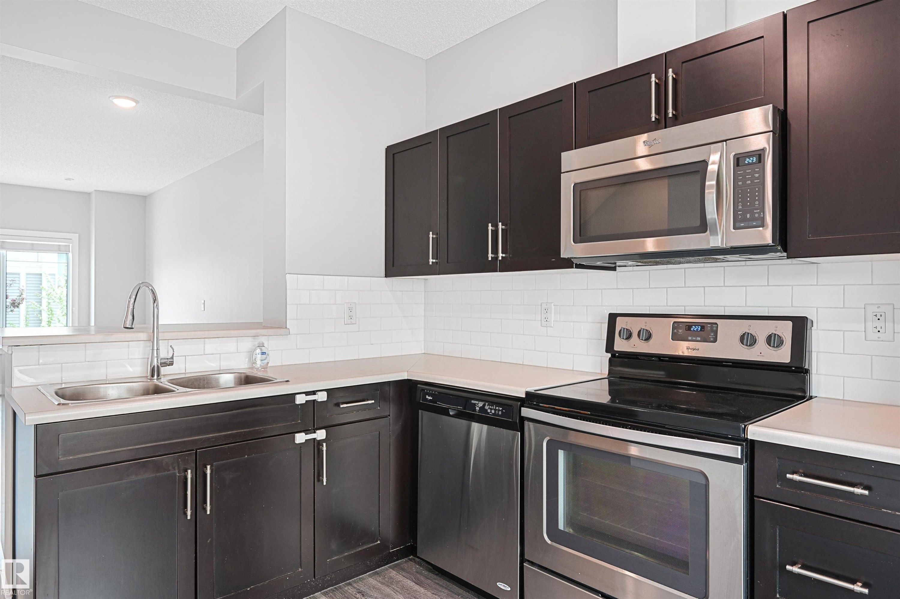 #102 804 Welsh Dr Sw, Edmonton, AB - Indoor Photo Showing Kitchen With Stainless Steel Kitchen With Double Sink