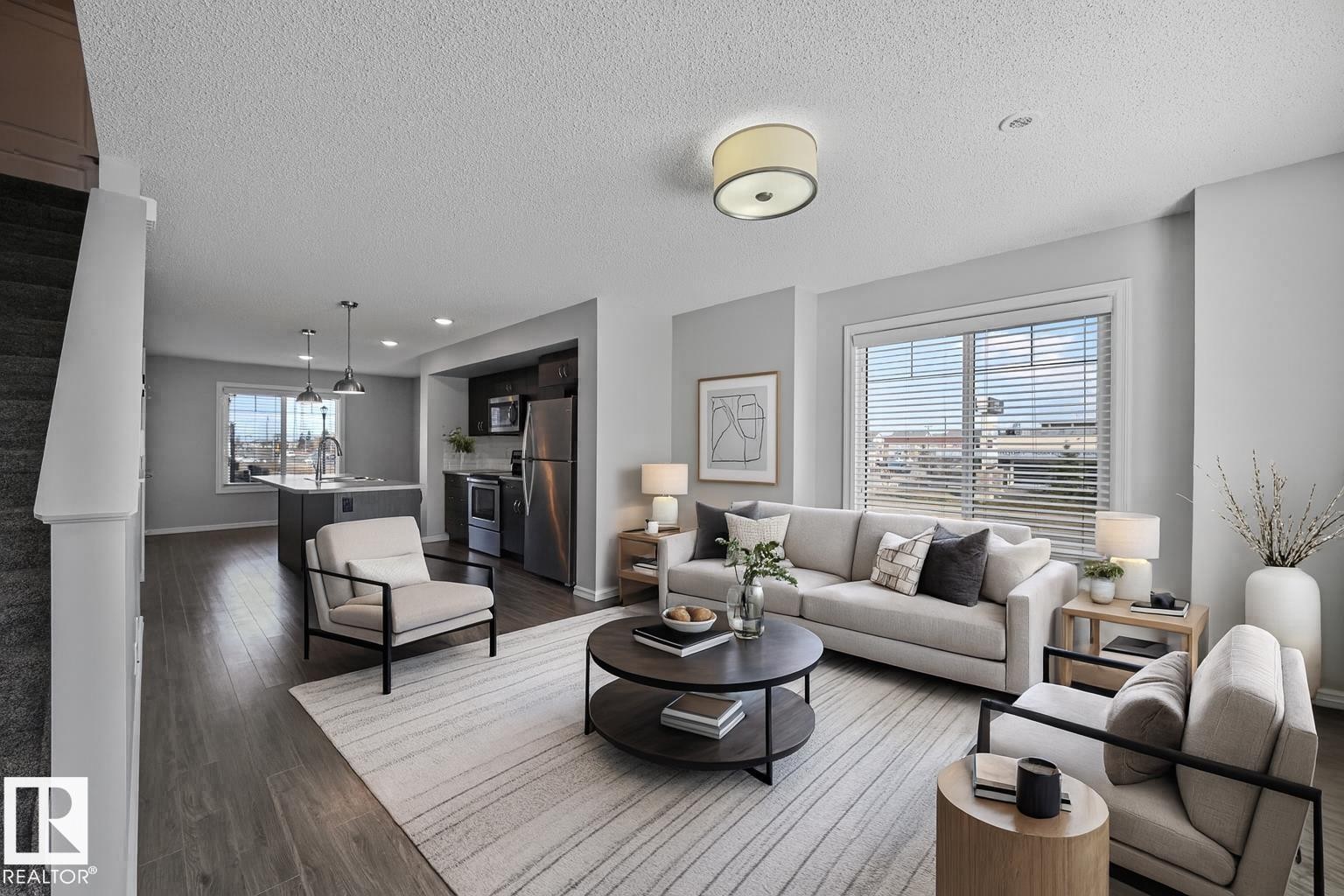 virtually staged - #34 2215 24 St Nw, Edmonton, AB - Indoor Photo Showing Living Room