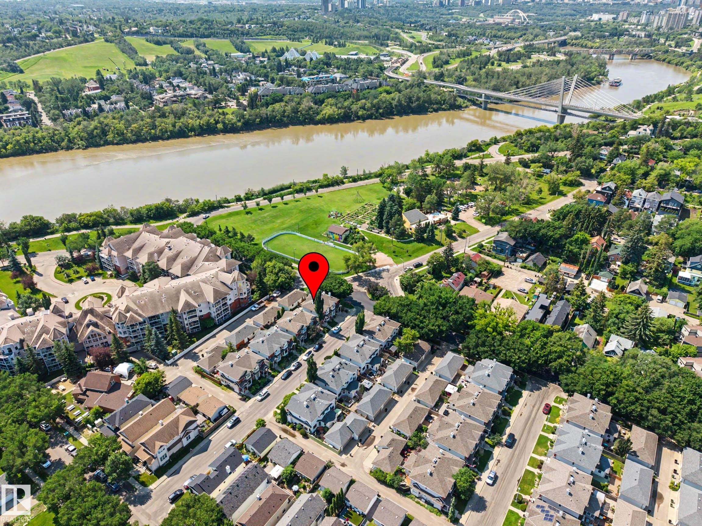 Aerial perspective highlighting a residential street and surrounding neighborhood - 9130 100A Avenue Nw, Edmonton, AB - Outdoor With View