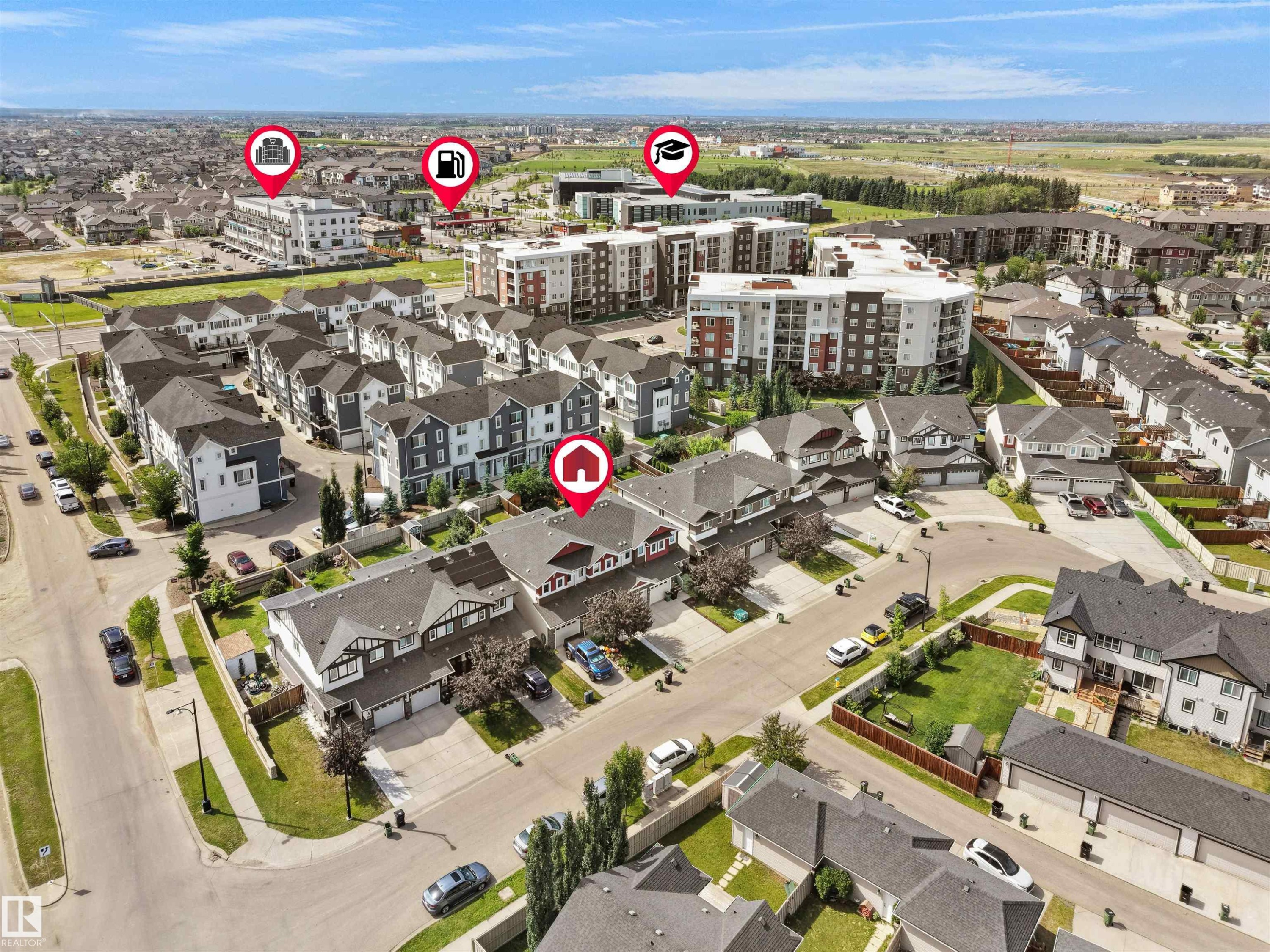 Aerial perspective showcasing a residential community with diverse housing types - 4487 Annett Common Sw, Edmonton, AB - Outdoor With View