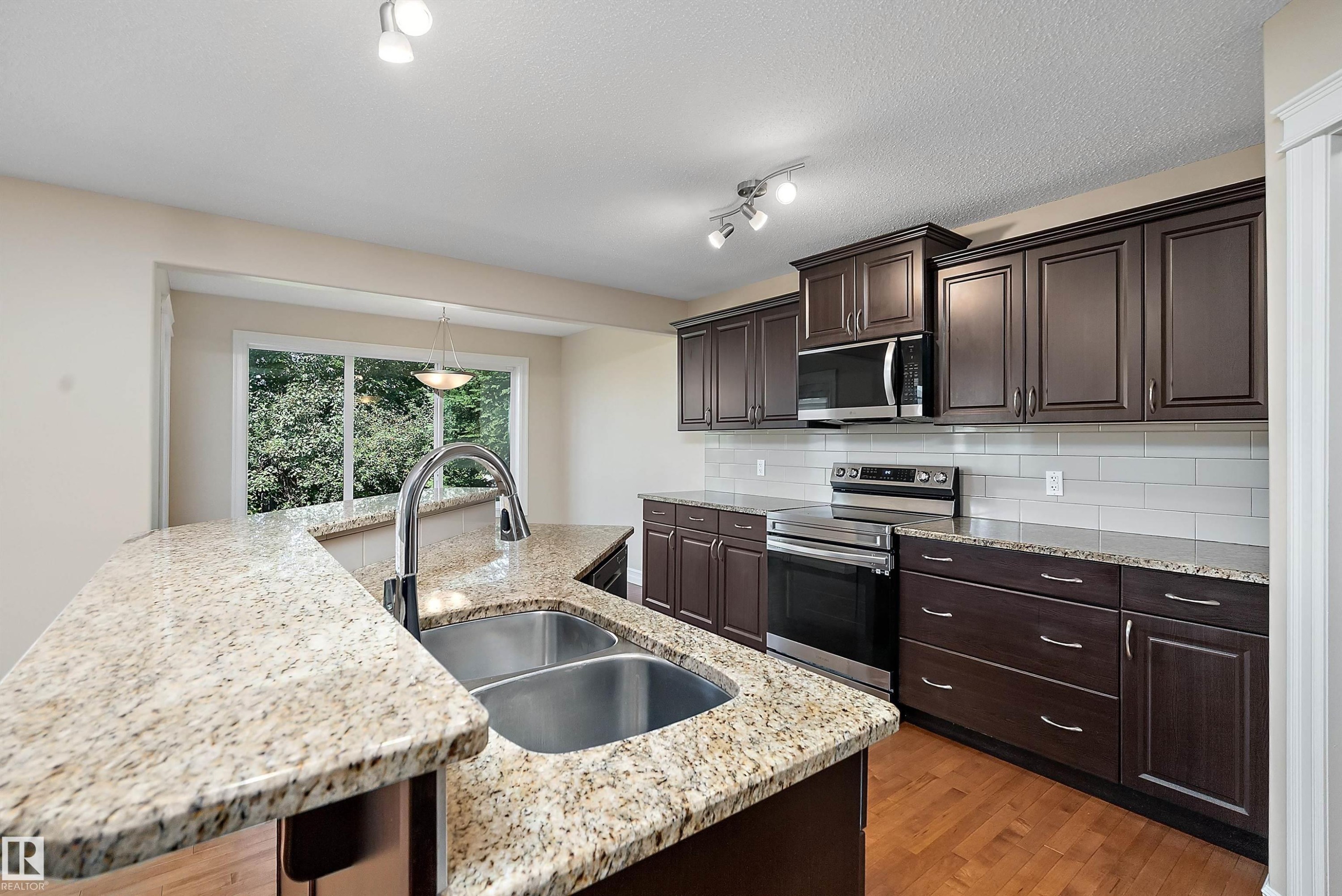 17330 8A Avenue Sw, Edmonton, AB - Indoor Photo Showing Kitchen With Double Sink