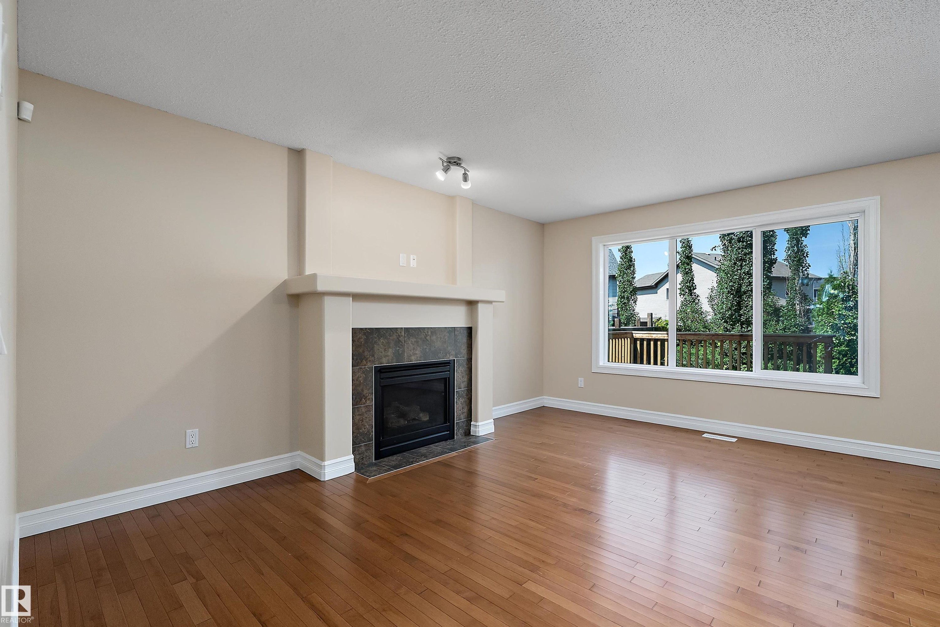 17330 8A Avenue Sw, Edmonton, AB - Indoor Photo Showing Living Room With Fireplace