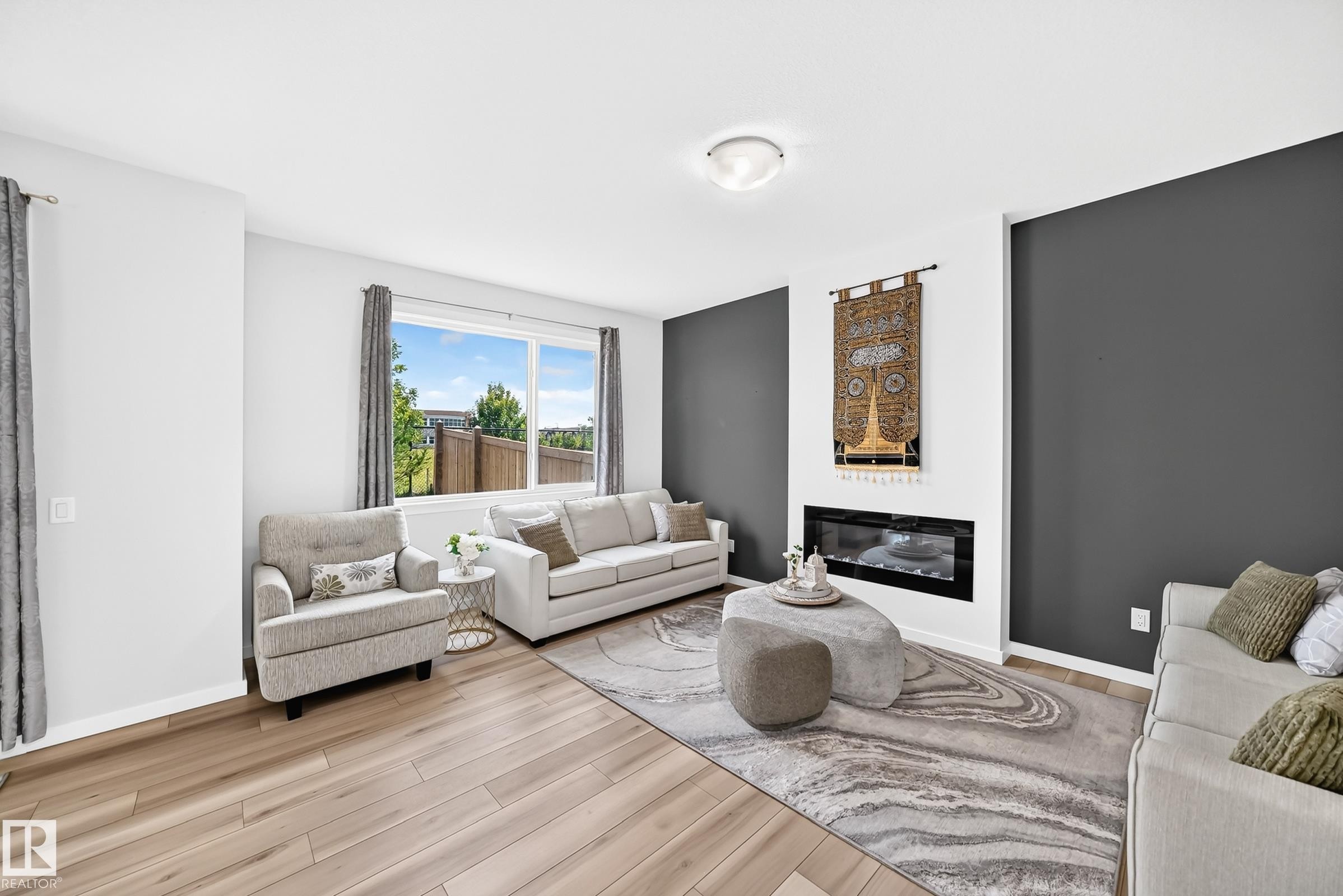 4018 Hawthorn Link Sw, Edmonton, AB - Indoor Photo Showing Living Room With Fireplace