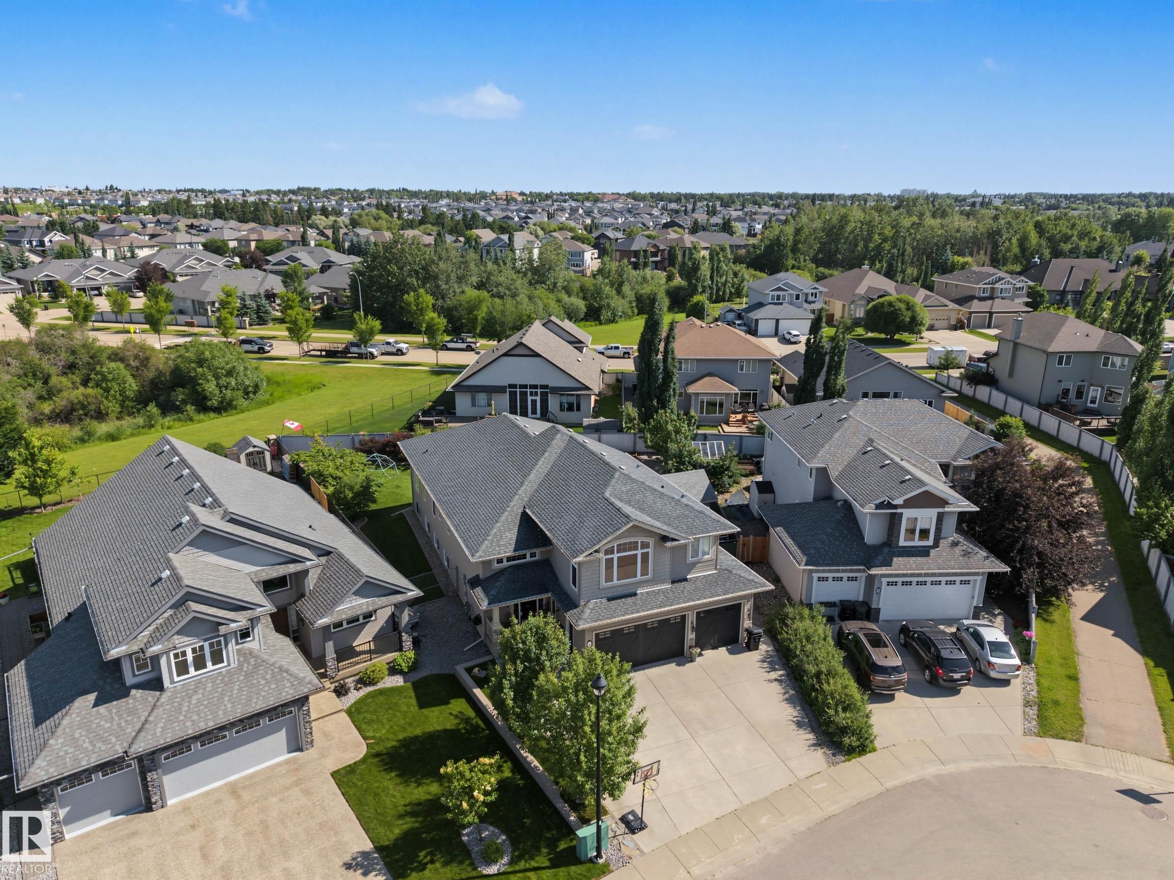 Residential neighborhood featuring varied architectural styles and mature landscaping - 38 Longview Point(E), Spruce Grove, AB - Outdoor With View