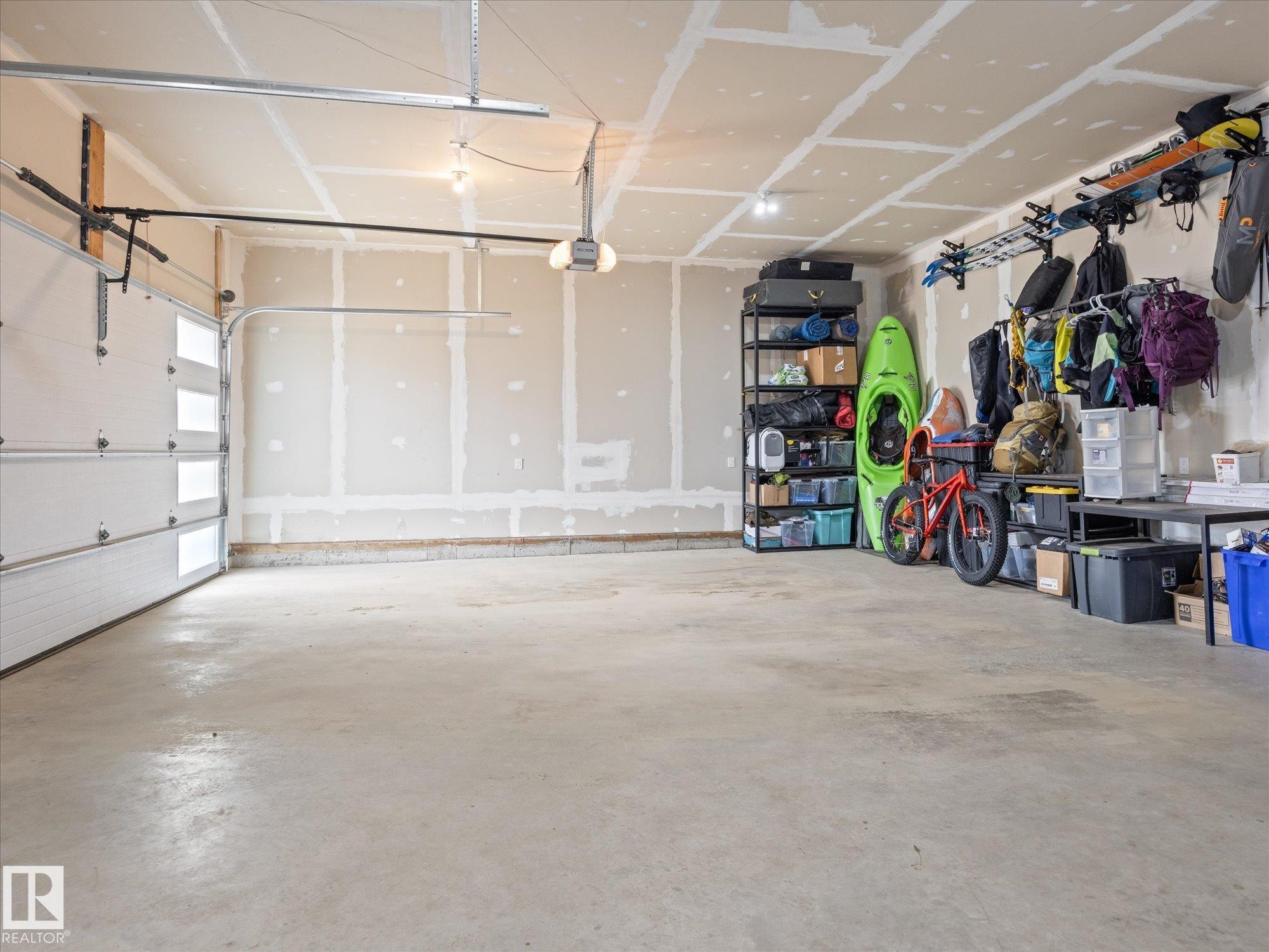 #90 50047 Rge Rd 244, Rural Leduc County, AB - Indoor Photo Showing Garage