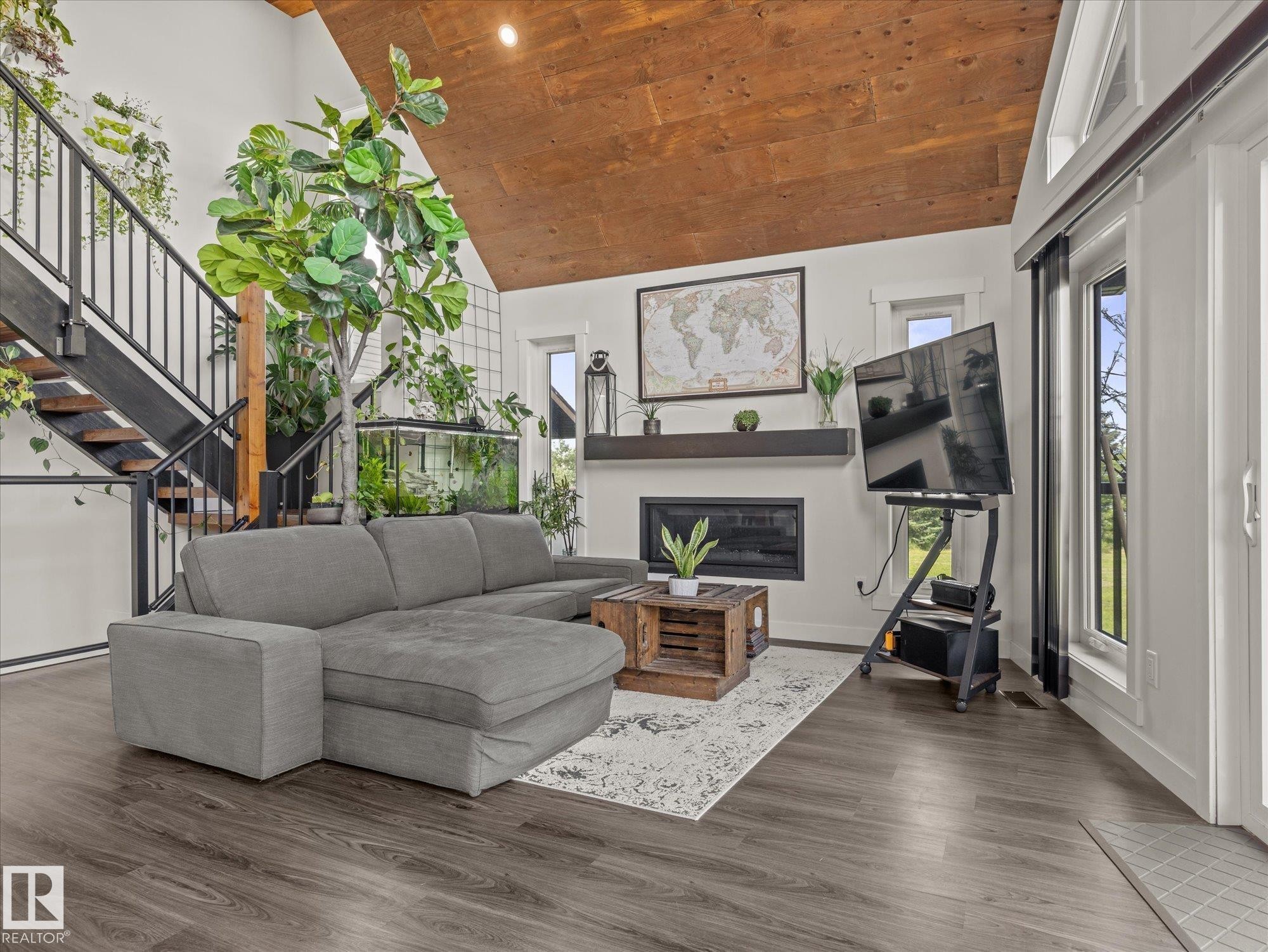#90 50047 Rge Rd 244, Rural Leduc County, AB - Indoor Photo Showing Living Room With Fireplace