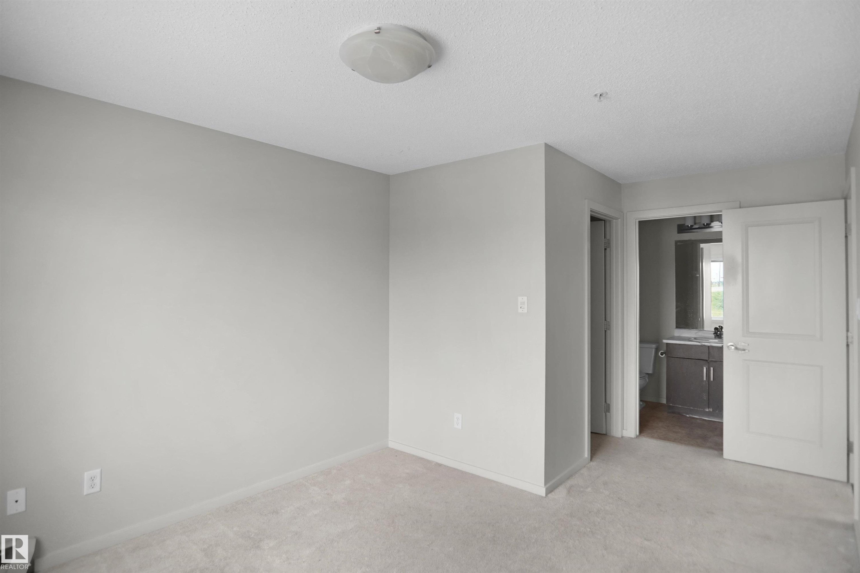 #202 142 Ebbers Bv Nw, Edmonton, AB - Indoor Photo Showing Other Room