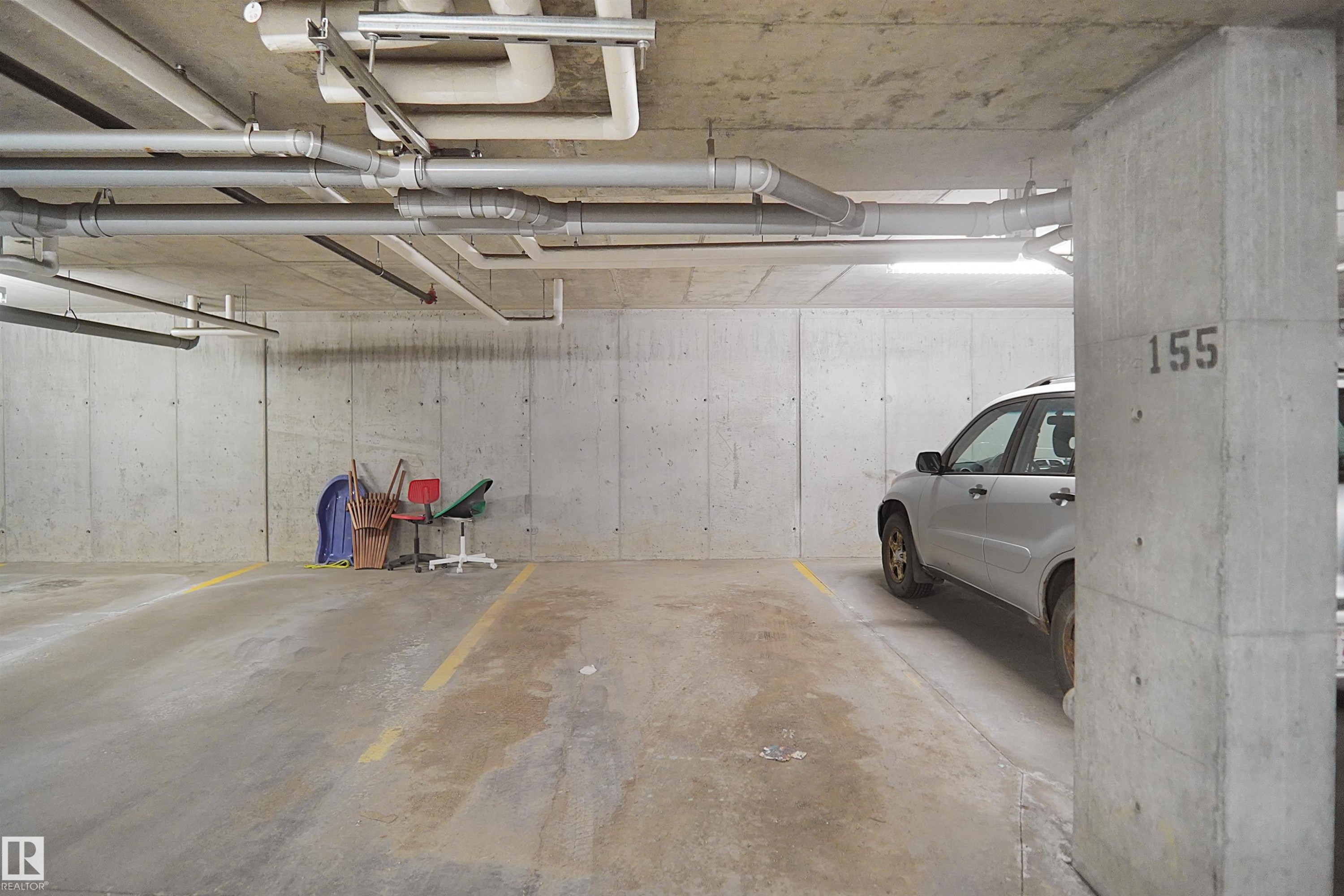 #202 142 Ebbers Bv Nw, Edmonton, AB - Indoor Photo Showing Garage