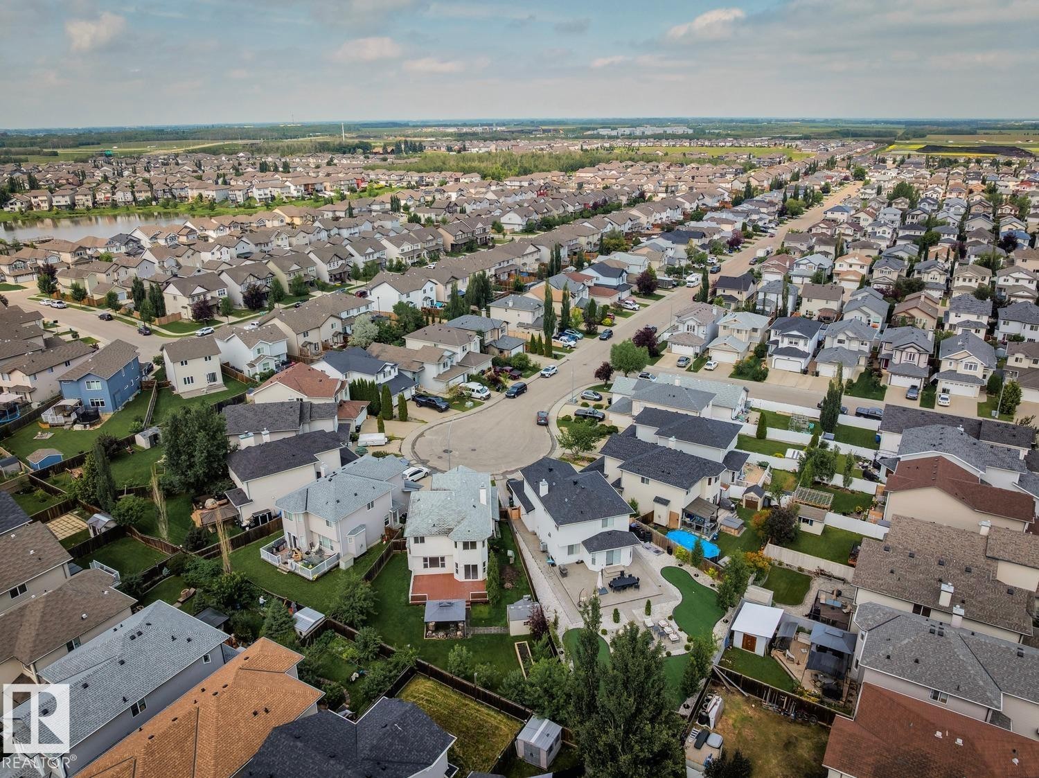 Established residential neighborhood with a variety of detached homes featuring multiple rooflines and extensive green spaces - 16765 119 Street Nw, Edmonton, AB