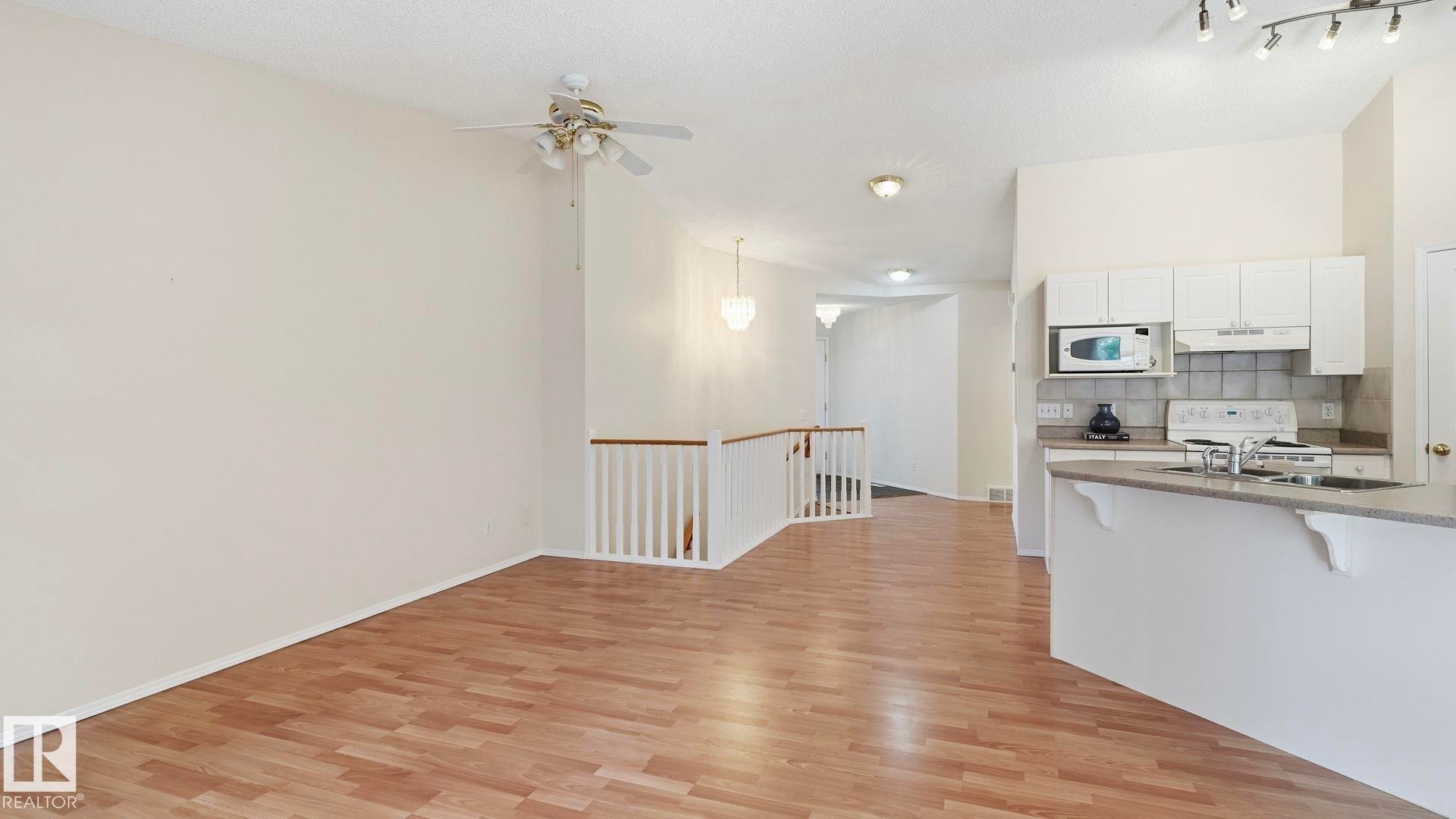 #31 8 Dechene Rd Nw, Edmonton, AB - Indoor Photo Showing Kitchen With Double Sink
