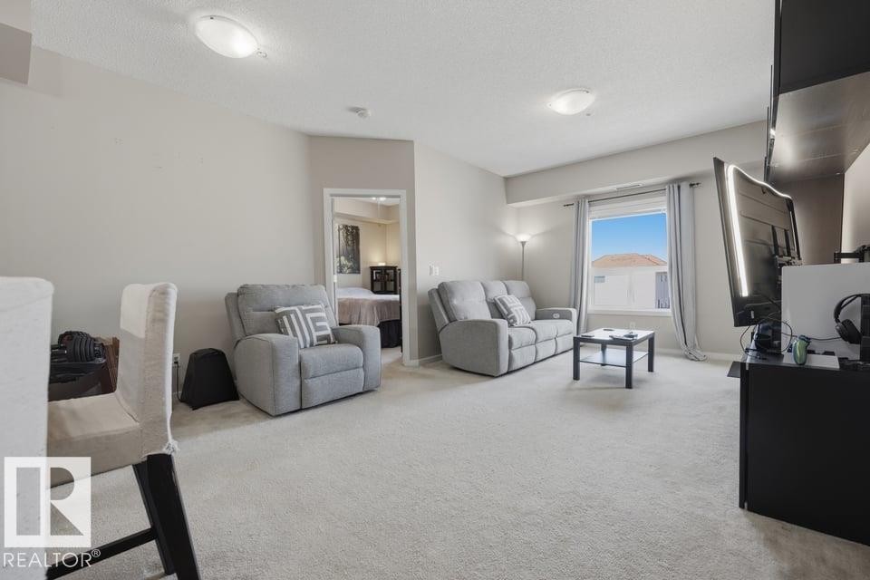#321 13835 155 Avenue Nw, Edmonton, AB - Indoor Photo Showing Living Room